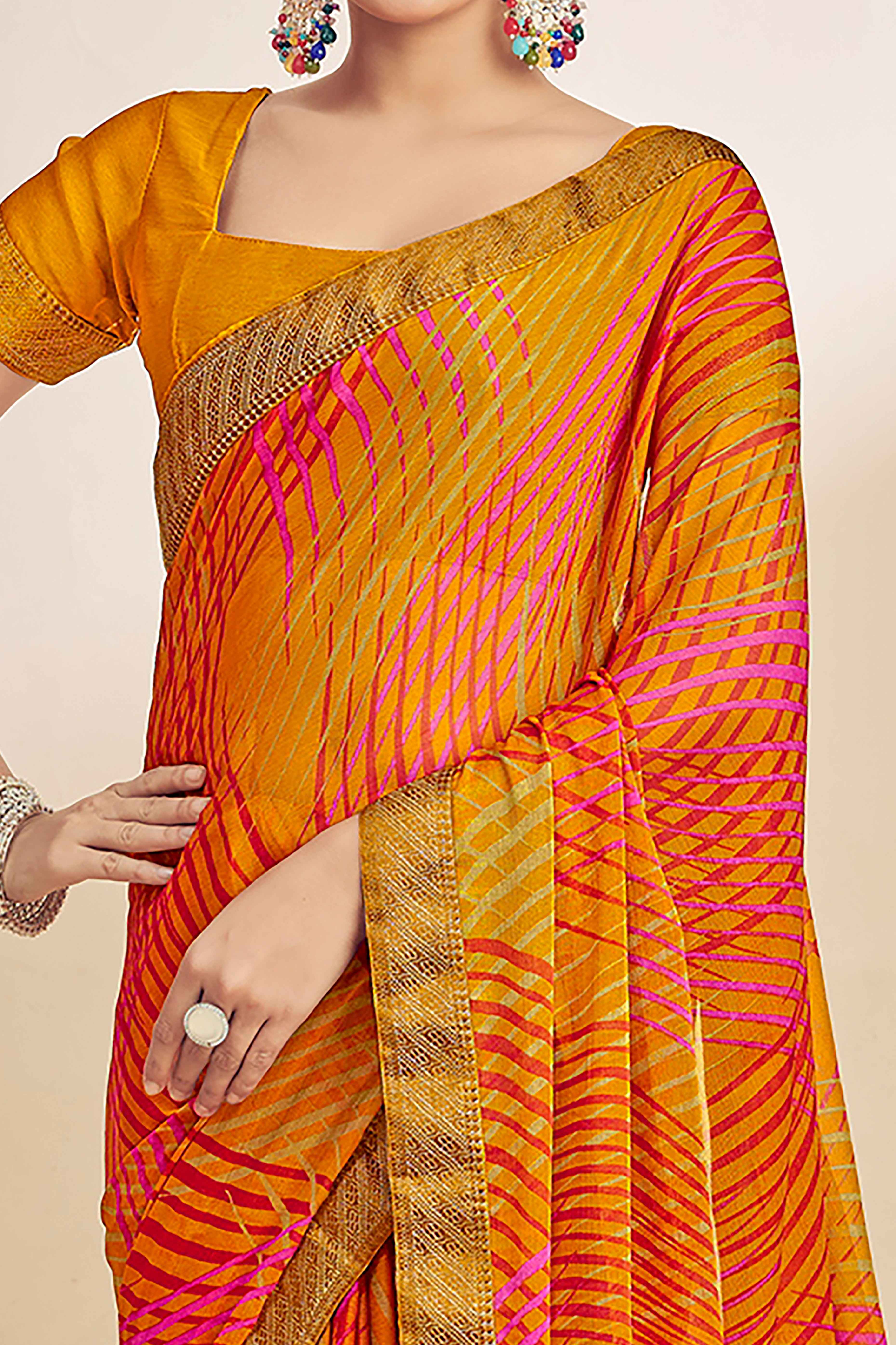 Mustard Chiffon Saree Adorned With Artistic Print & Finely Crafted Woven Lace Border