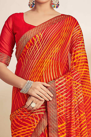 Orange Chiffon Saree Adorned With Artistic Print & Finely Crafted Woven Lace Border