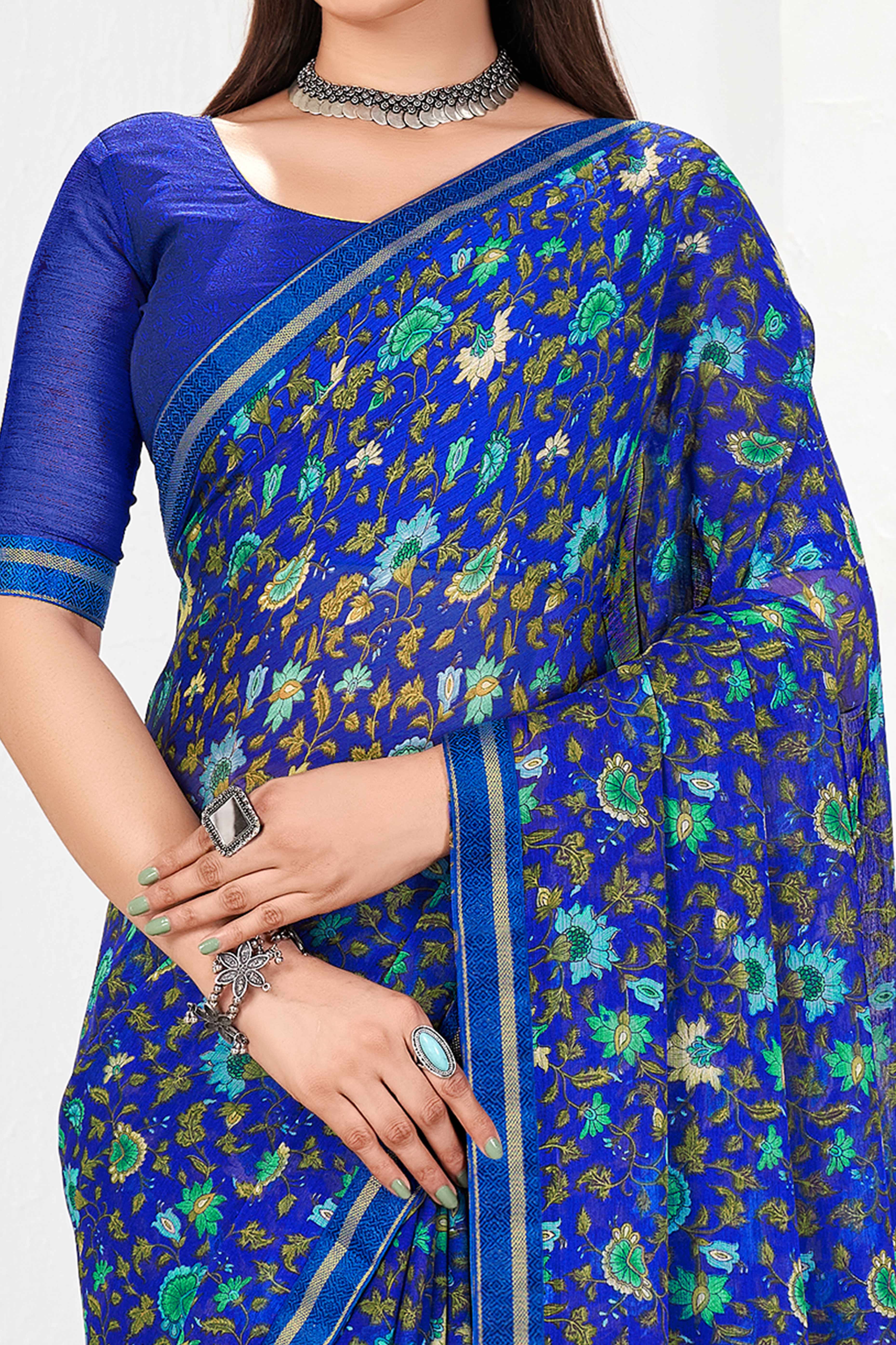 Sophisticated Floral Printed Chiffon Saree In Blue With Delicate Lace Border