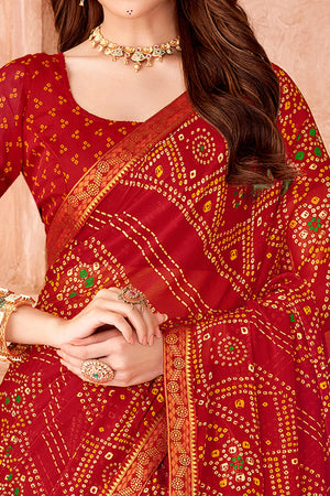 Red Chiffon Saree Featuring Traditional Bandhani Prints & A Graceful Lace Edge