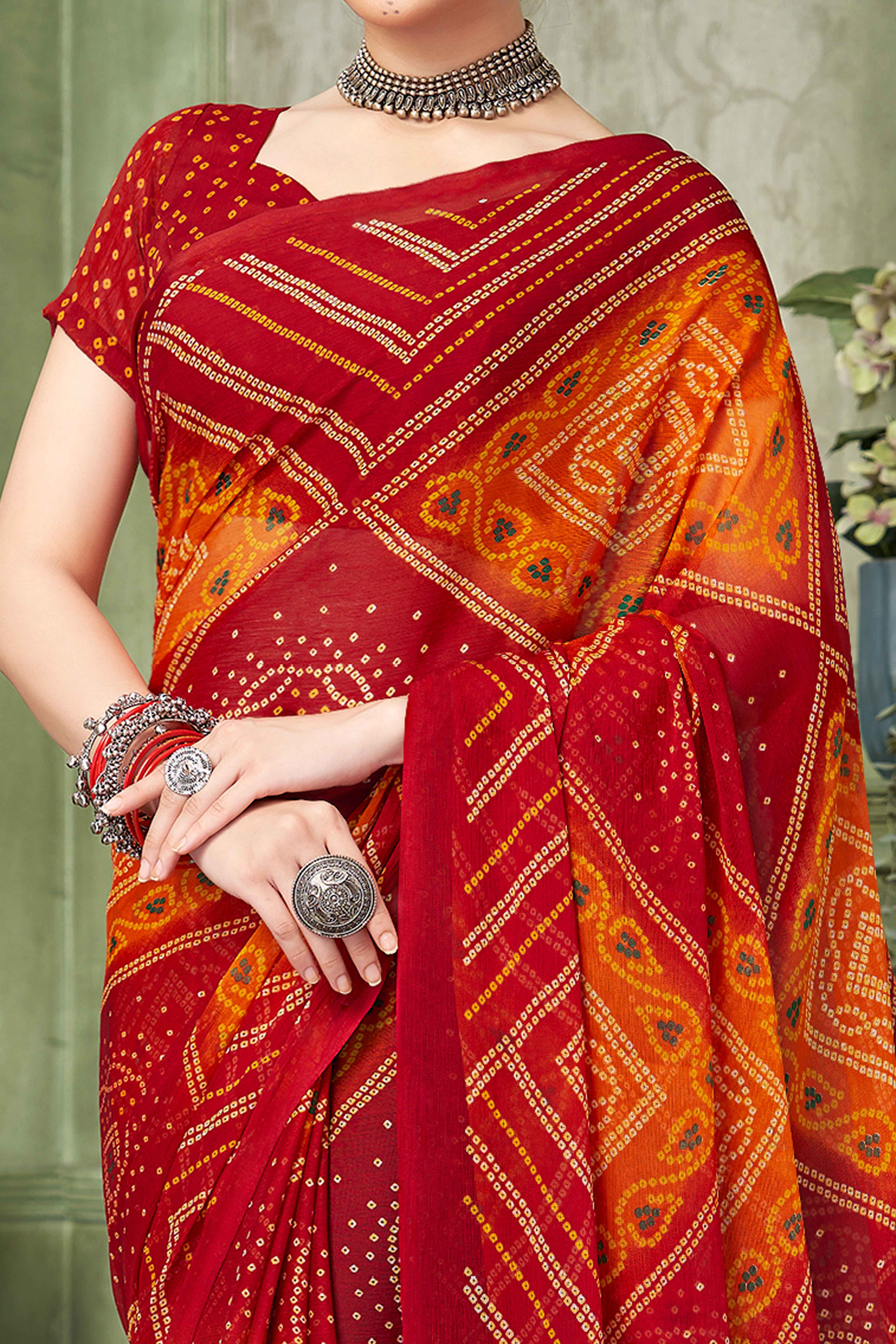 Red Chiffon Saree Adorned With Traditional Bandhani Print