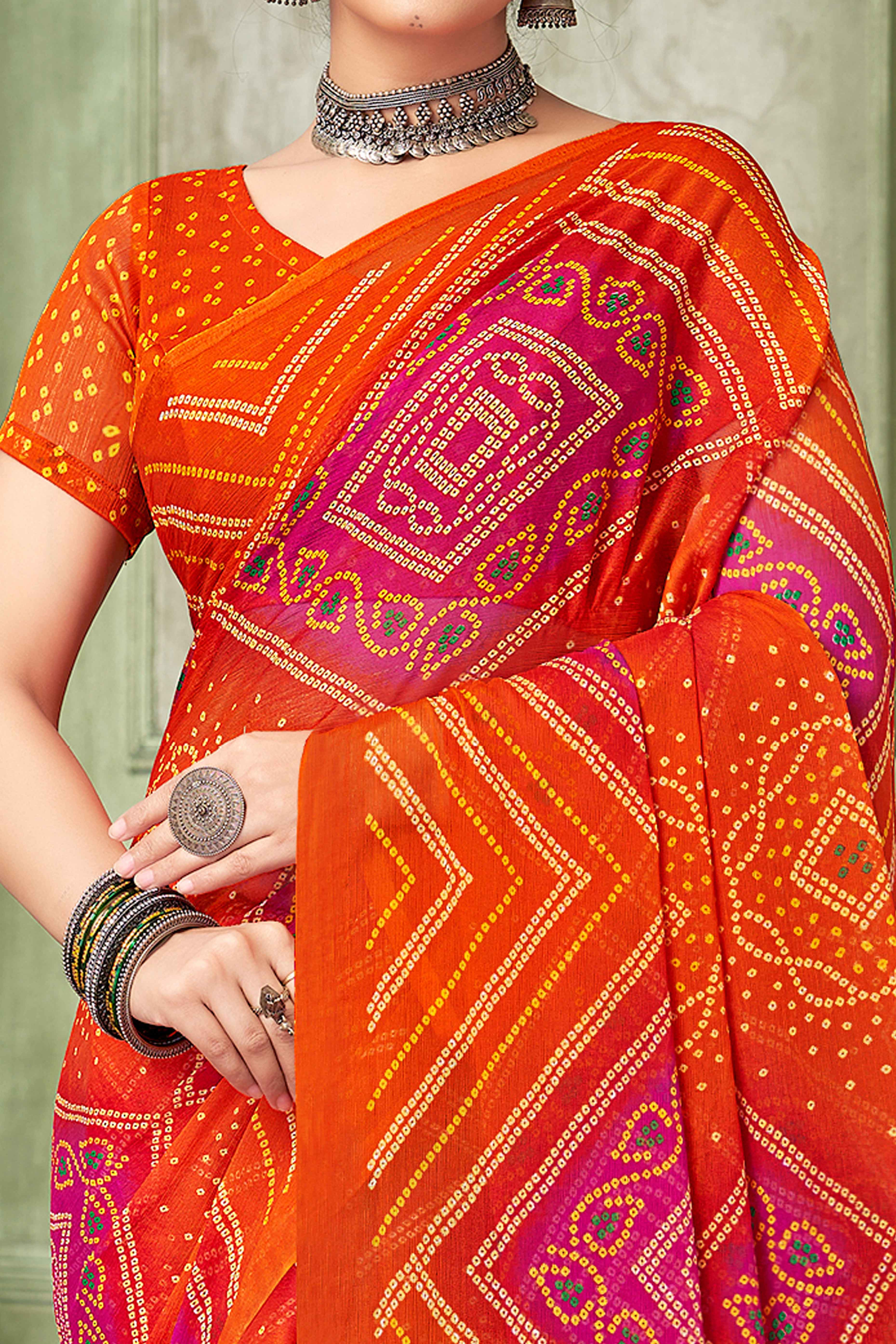 Orange Chiffon Saree Adorned With Traditional Bandhani Print
