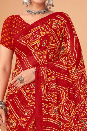 Red Bandhani Printed Chiffon Saree Accented With Intricate Lace Border Work