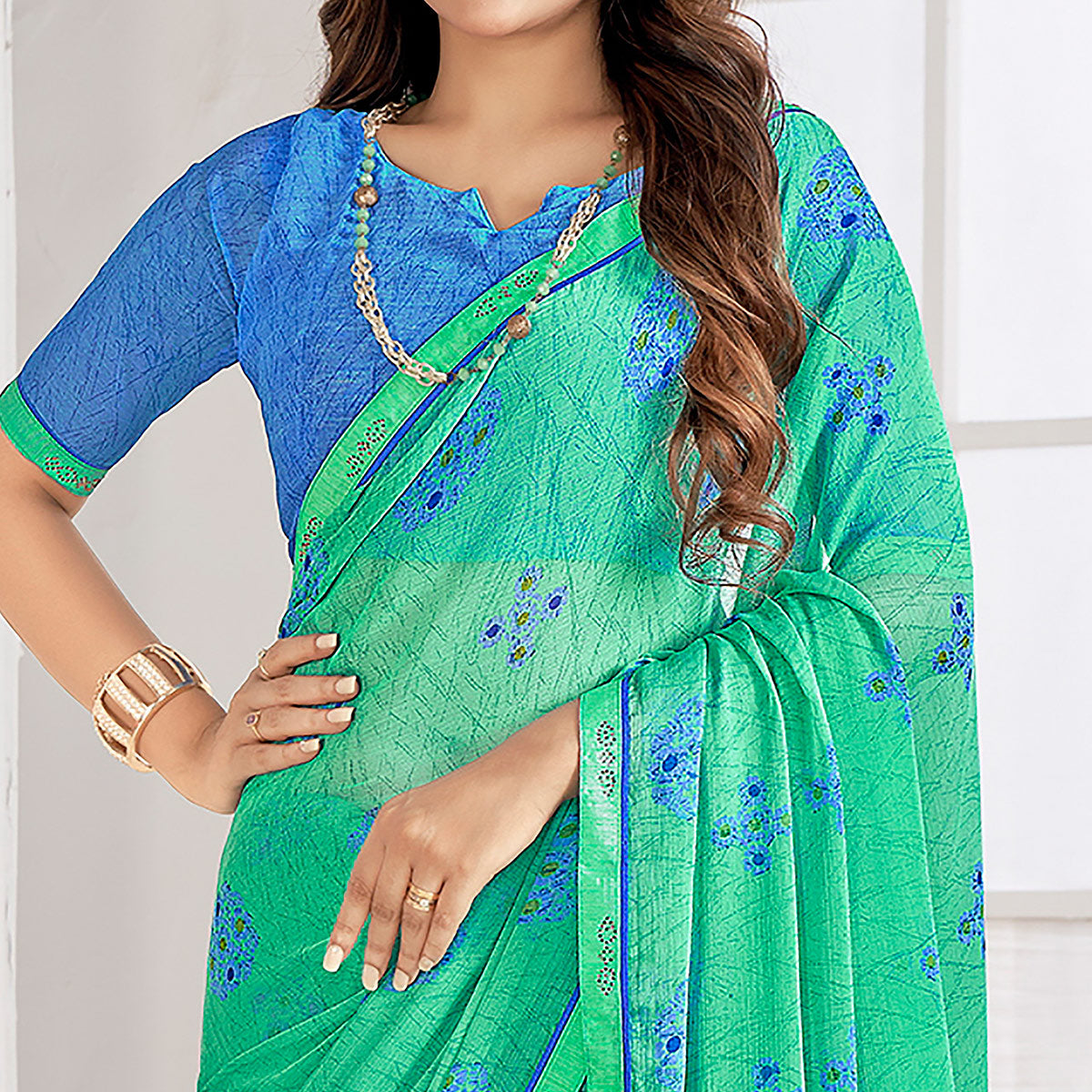 Turquoise Printed With Swarovski Chiffon Saree