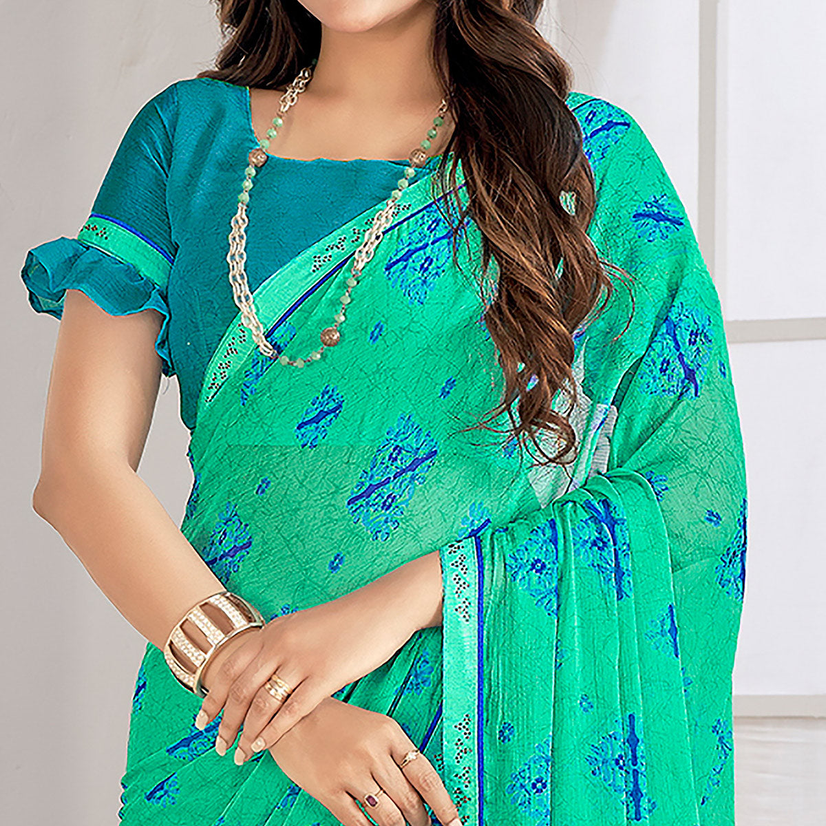 Turquoise Printed With Swarovski Chiffon Saree