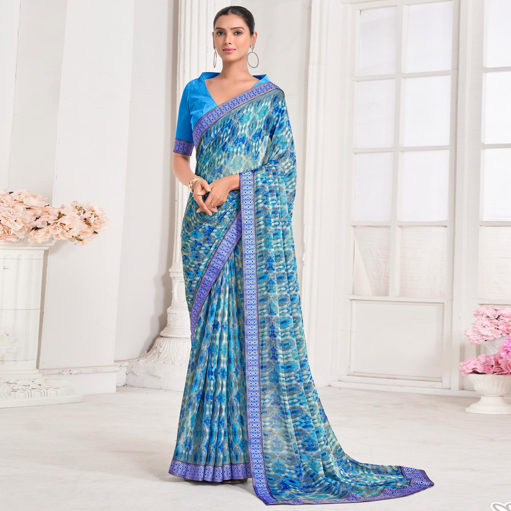 Blue Printed Chiffon Saree With Lace Border