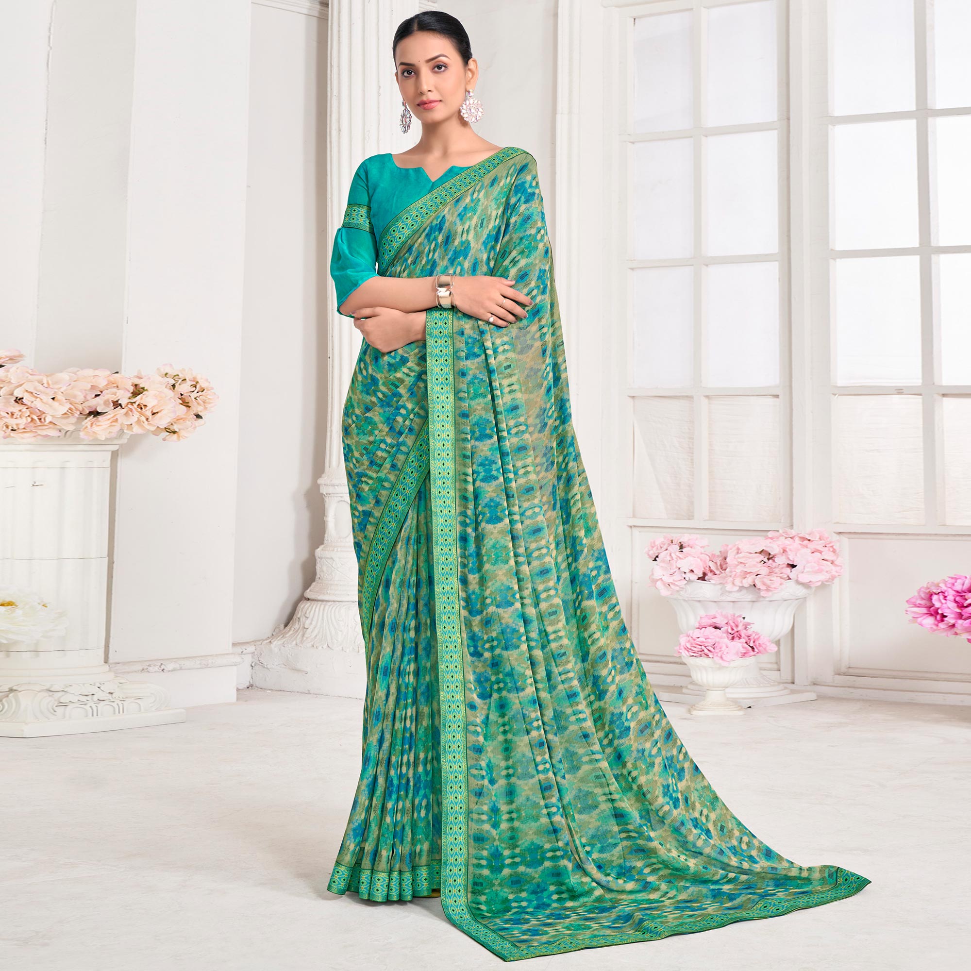 Turquoise Printed Chiffon Saree With Lace Border