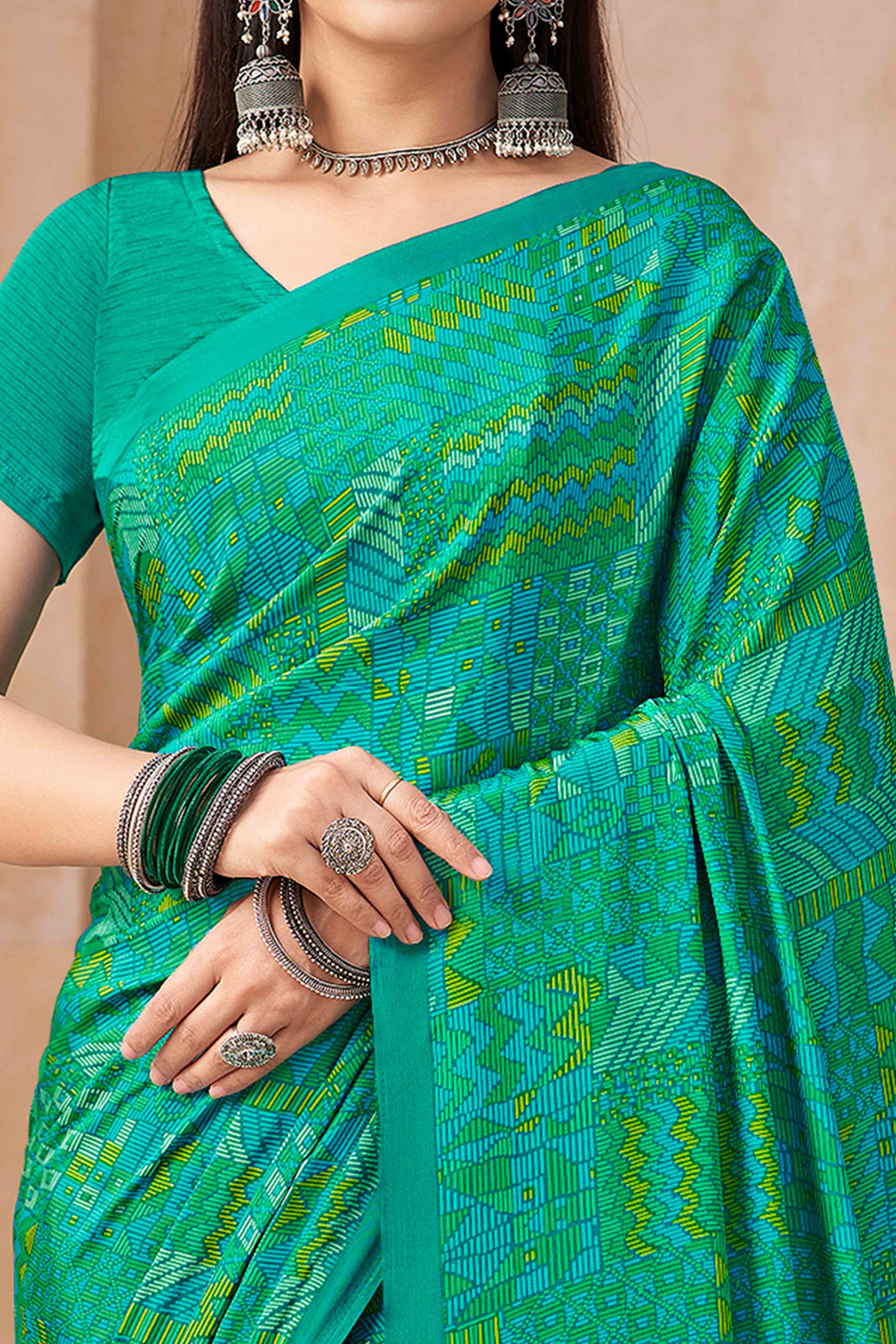 Rama Green Crepe Silk Saree Featuring Delicate Geometric Print Work