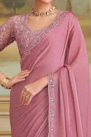 Graceful Onion Pink Sparkle Georgette Saree Adorned With Floral Sequins Embroidered Lace Border