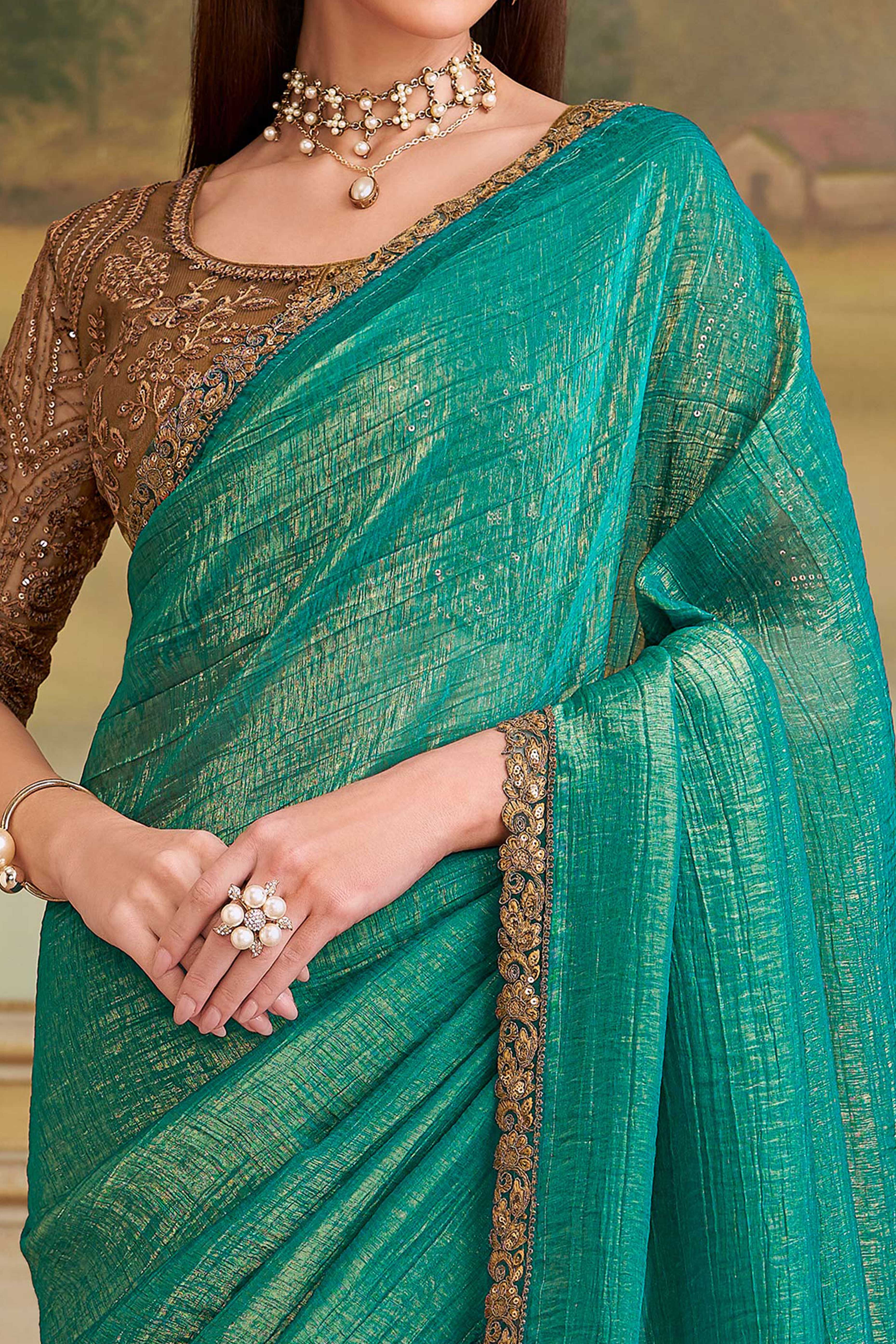 Stylish Light Sea Green Georgette Saree Featuring Floral Sequins Embroidered Designer Lace Border