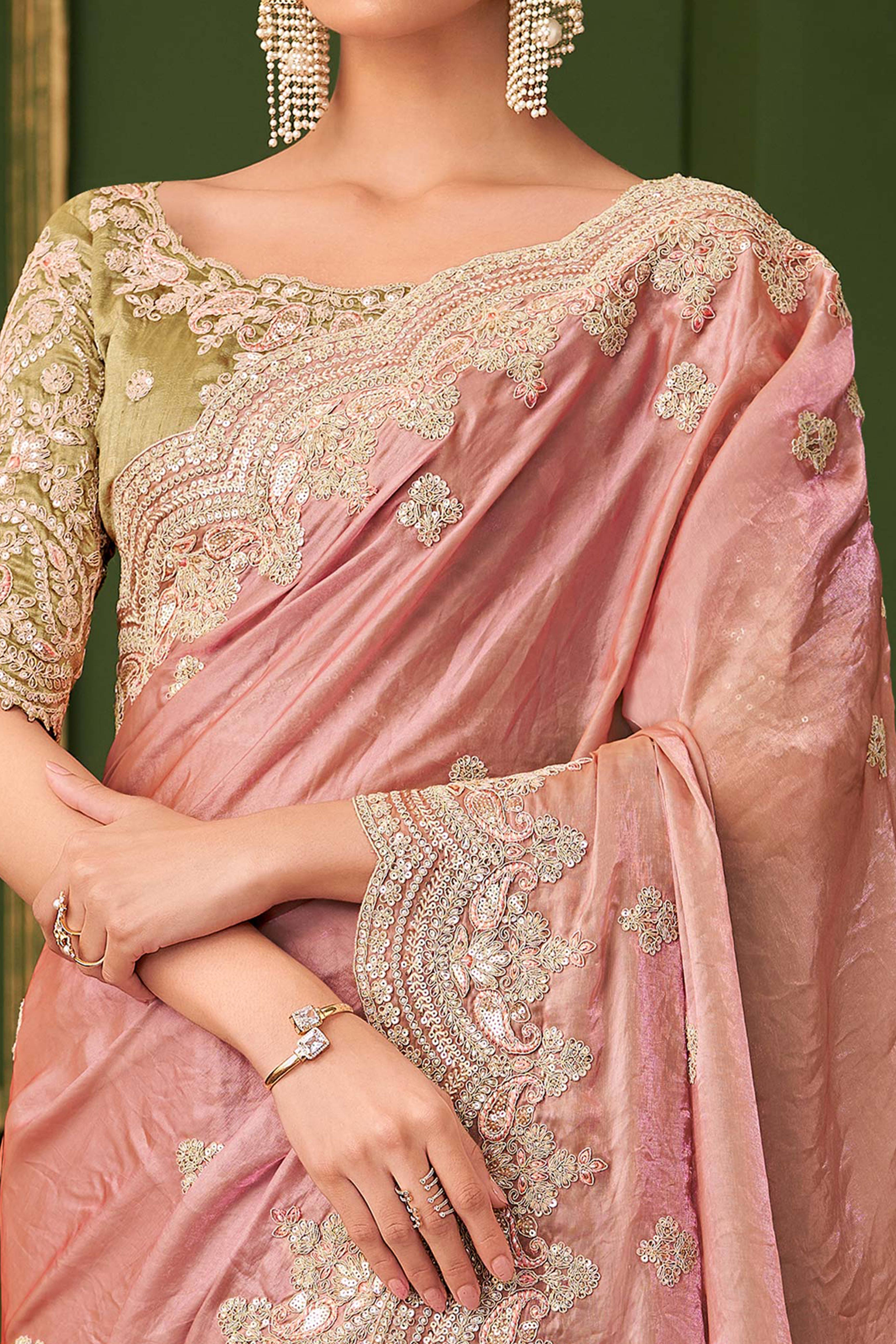 Graceful Peach Georgette Saree Adorned With Floral Cording Sequins Embroidery & Cutwork Border