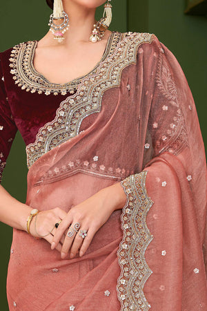 Charming Peach Georgette Saree Adorned With Floral Cording Sequins Embroidery & Cutwork Border