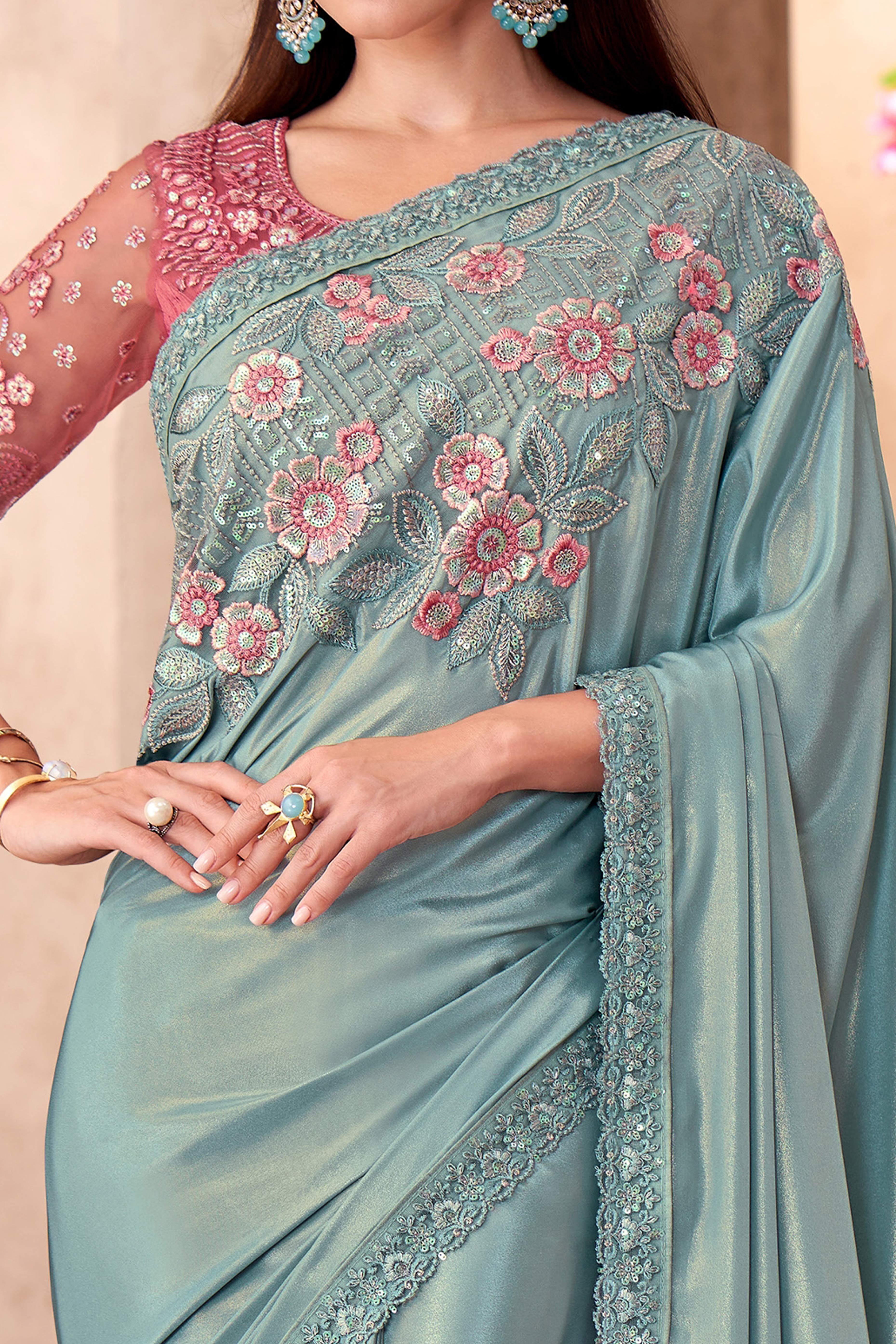 Party Perfect Turquoise Crepe Saree with Shimmering Sequin and Thread Embroidery