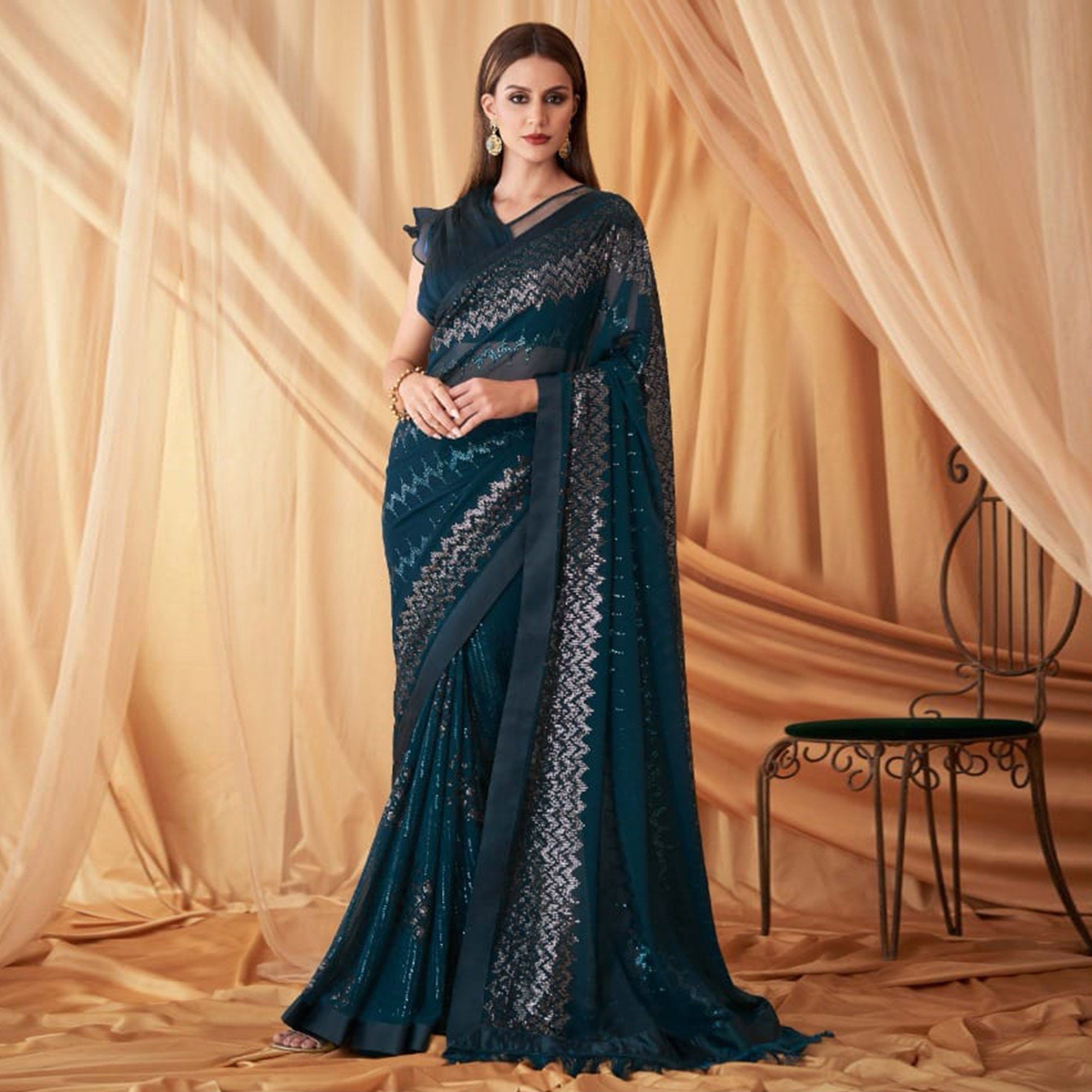 Teal Blue Sequins Embroidered Georgette Saree With Tassels