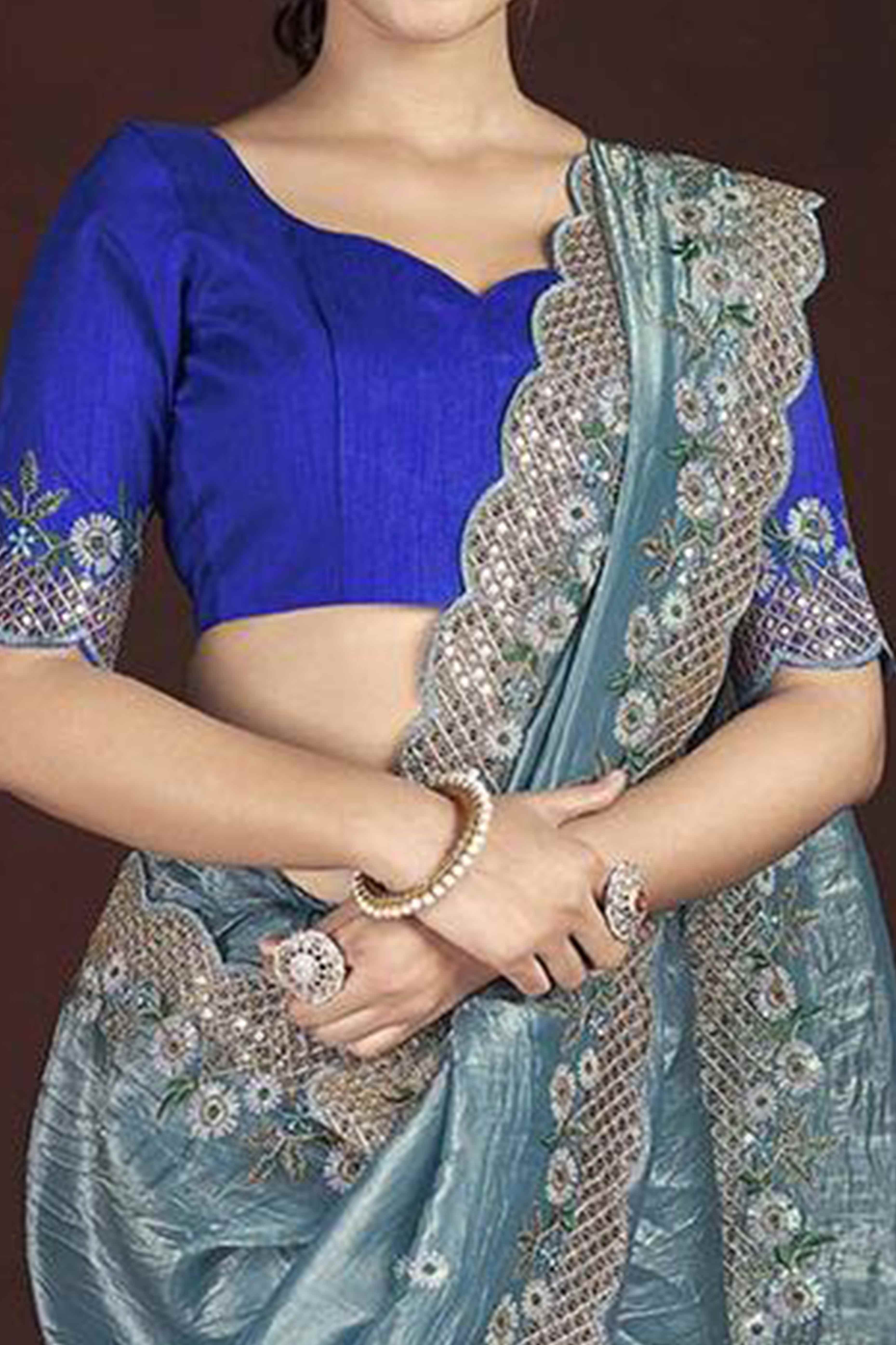 Blue Organza Saree with Embroidery on the Edges for a Graceful Contemporary Look