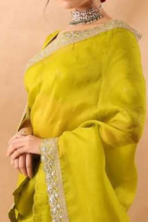 Lime Green Soft Tissue Saree Adorned with Alluring Sequin Detailing for a Luxurious Look