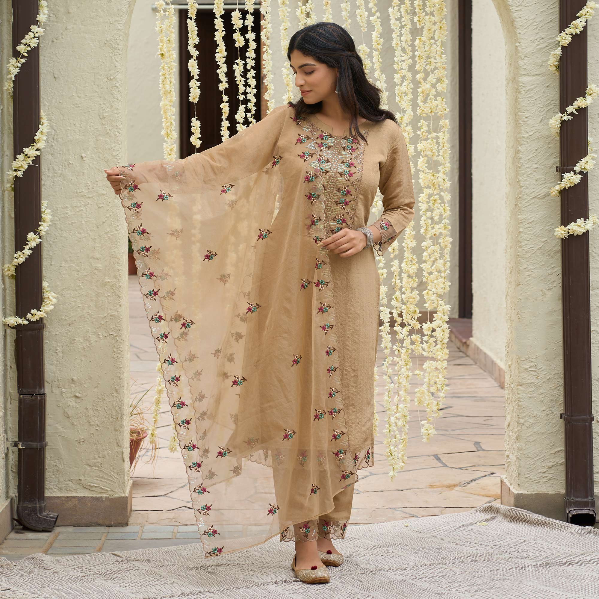 Chikoo Floral Embroidered Rayon Salwar Suit