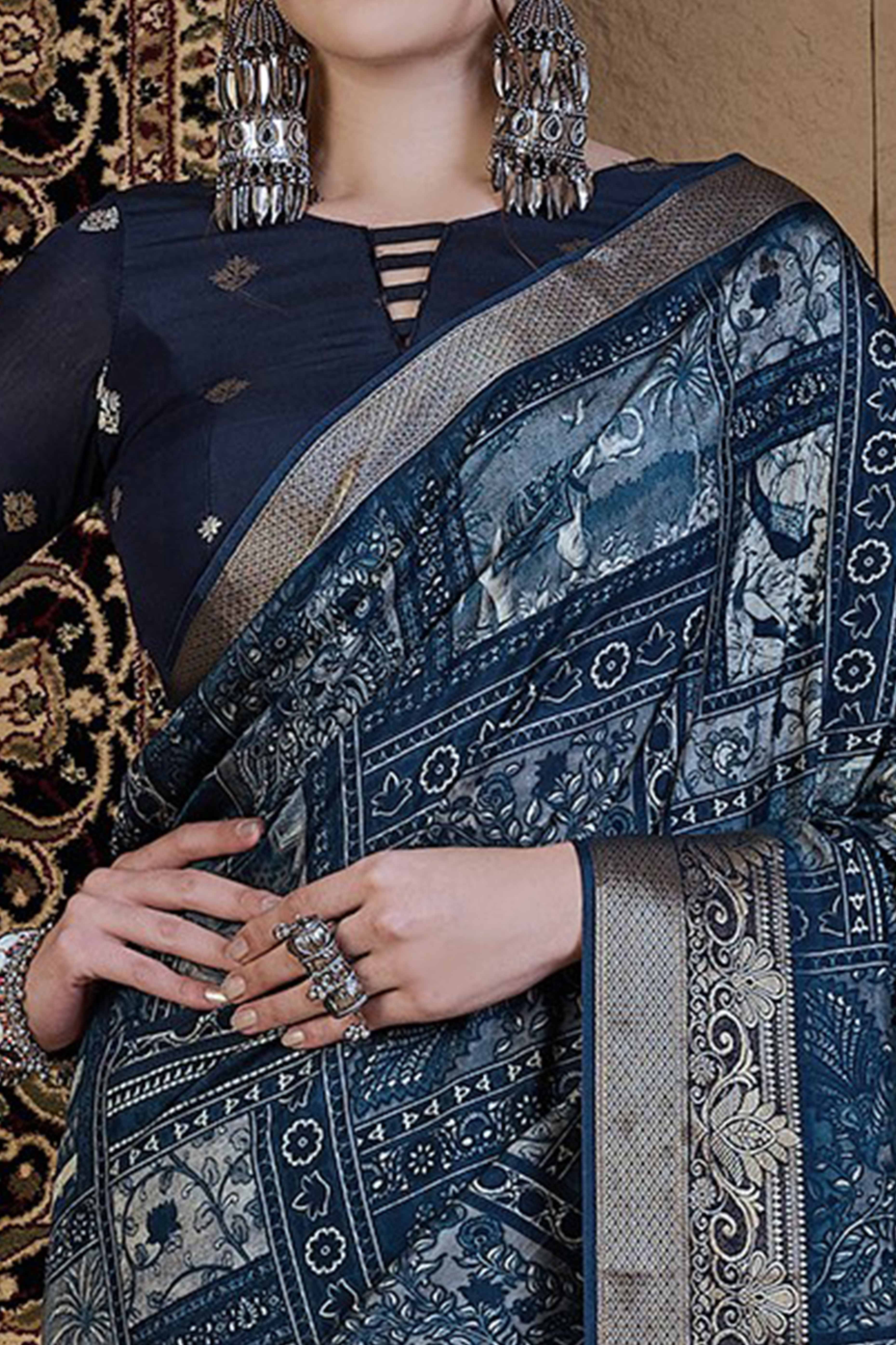 Blue Viscose Saree Featuring Delicate Floral Prints and a Rich Zari Border