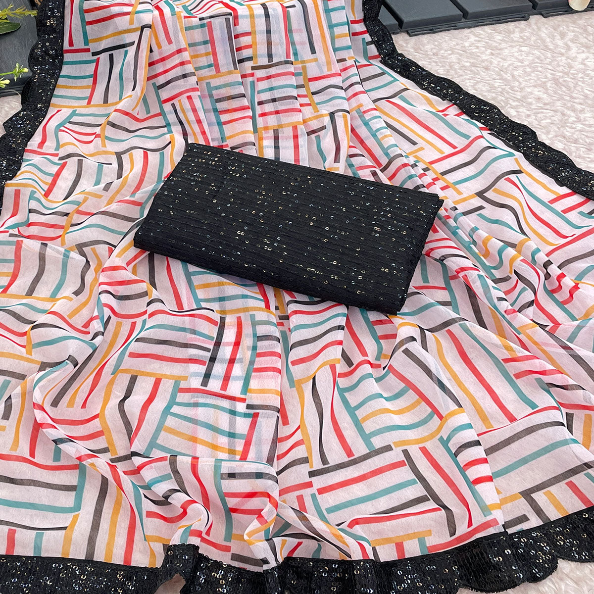 White Printed Georgette Saree With Sequins Border