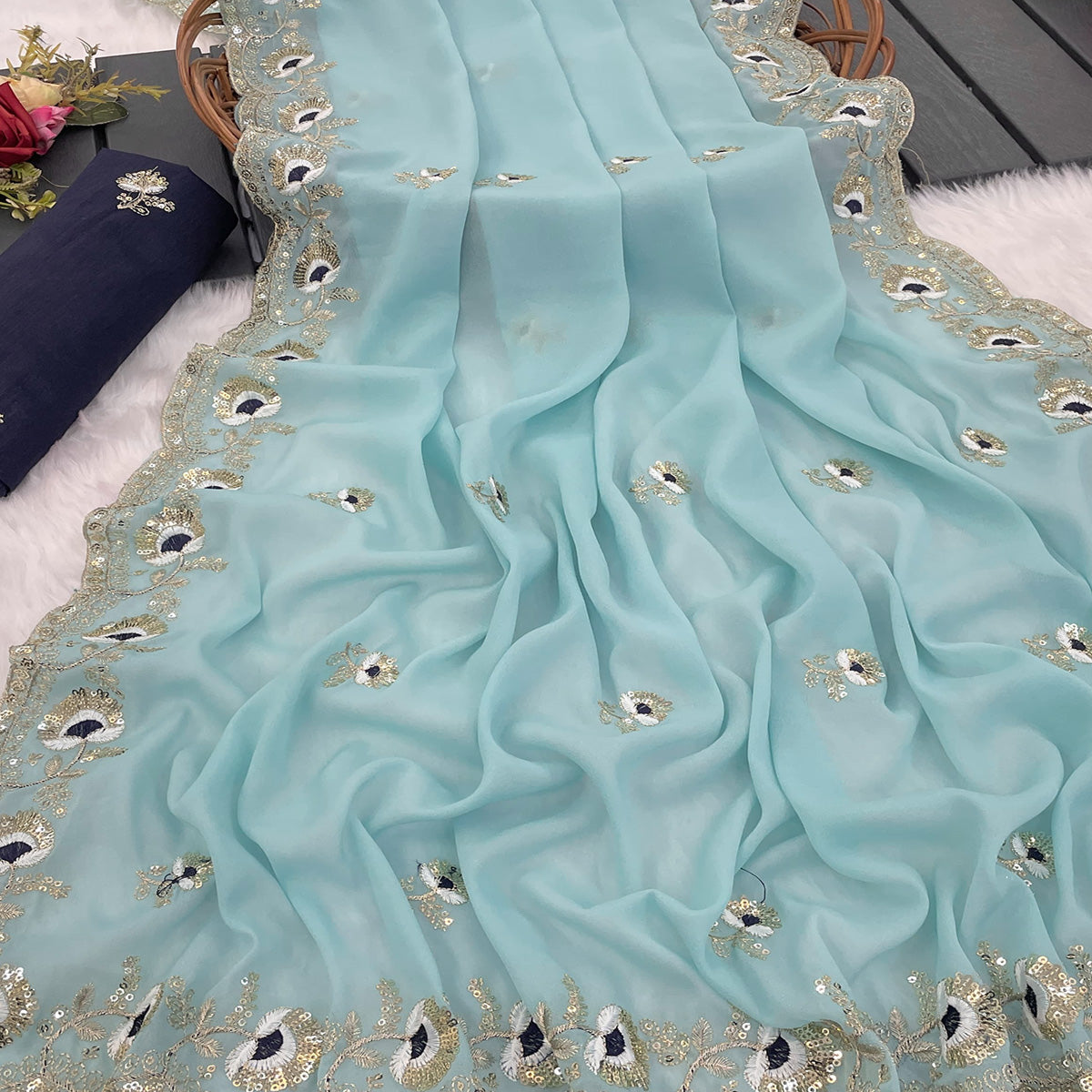 Blue Georgette Silk Saree With Floral Sequin Embroidery & Graceful Cutwork Detailing Border