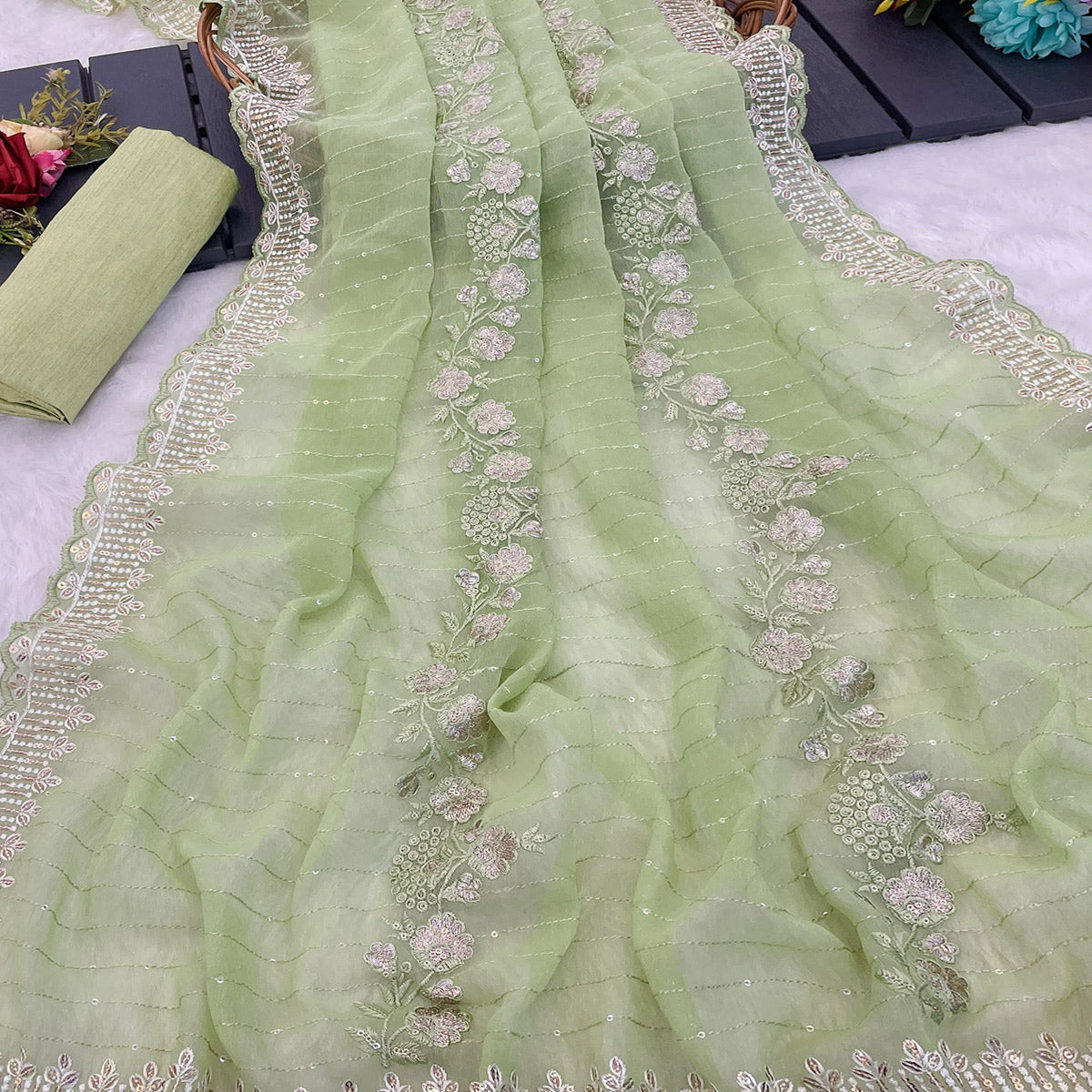 Green Shimmer Chiffon Saree with Floral Sequin Embroidery & Fine Cutwork Detailing