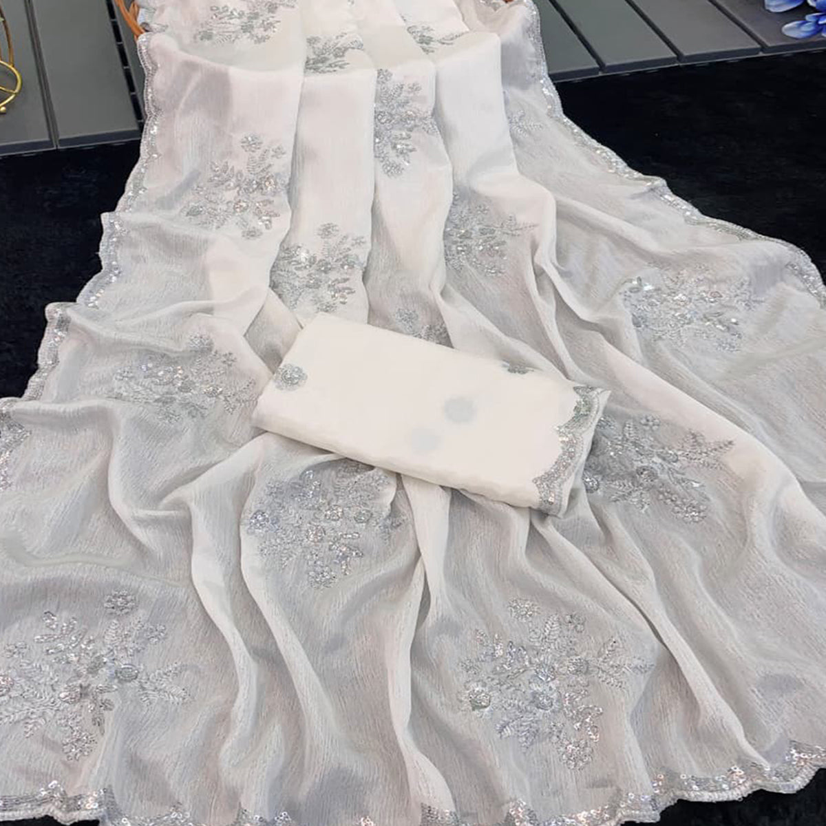 Designer Off White Pure Chinon Saree Highlighted with Elegant Sequins Embroidery