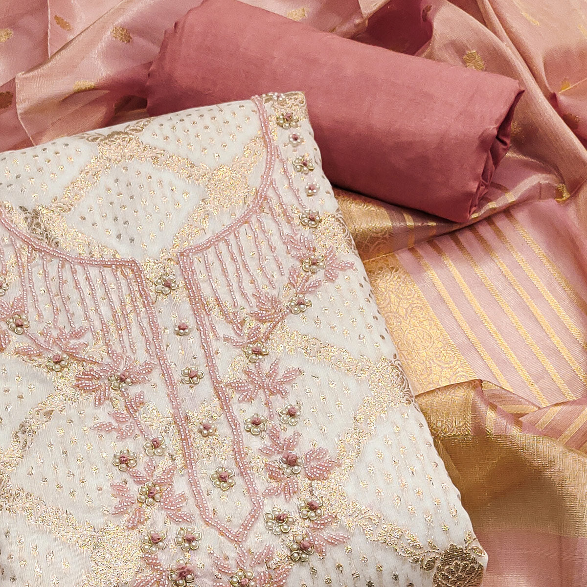 Off white & Pink Woven With Handwork Muslin Dress Material