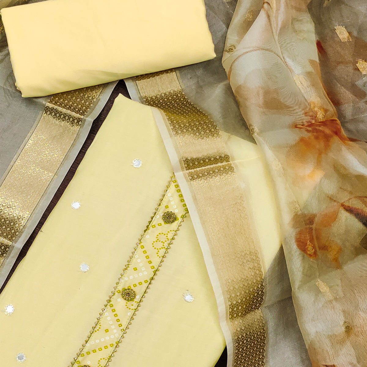 Yellow Cotton Silk Dress Material With Intricate Thread Embroidery With Handwork
