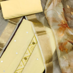 Yellow Cotton Silk Dress Material With Intricate Thread Embroidery With Handwork