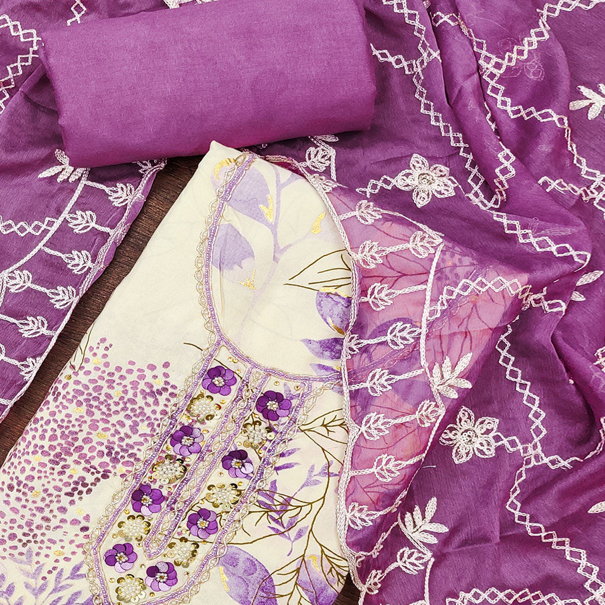 Cream & Purple Floral Printed Pure Cotton Dress Material With Intricate Moti & Stones work