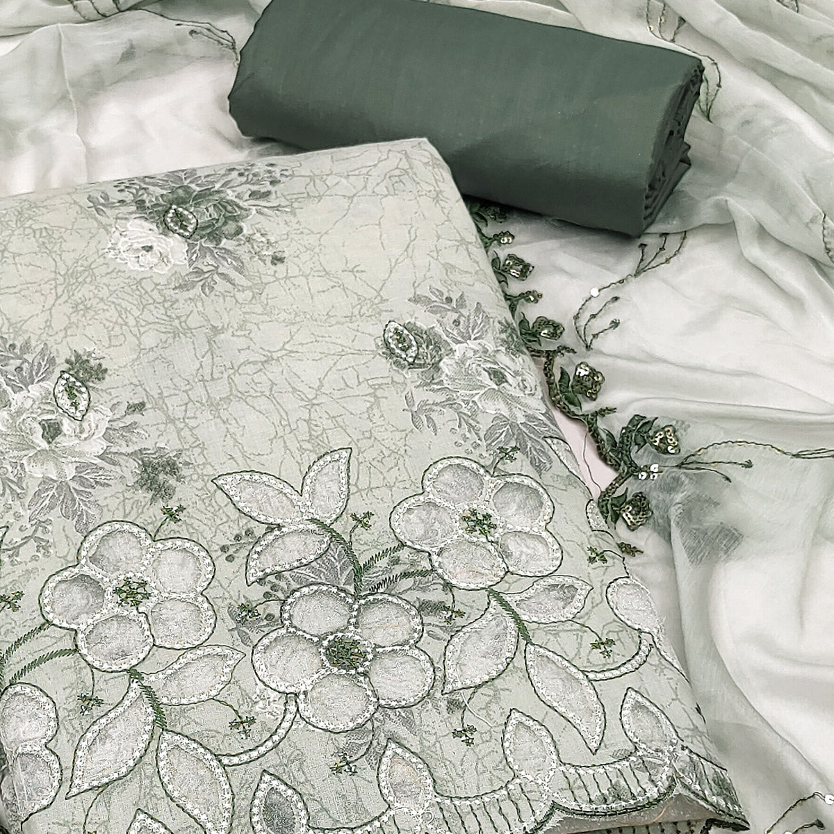 Green Floral Cambric Cotton Dress Material With Elegant Embroidery Work