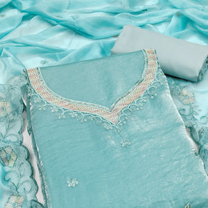 Turquoise Ensemble With Floral Sequins Embroidery Detailing On Satin Viscose Dress Material