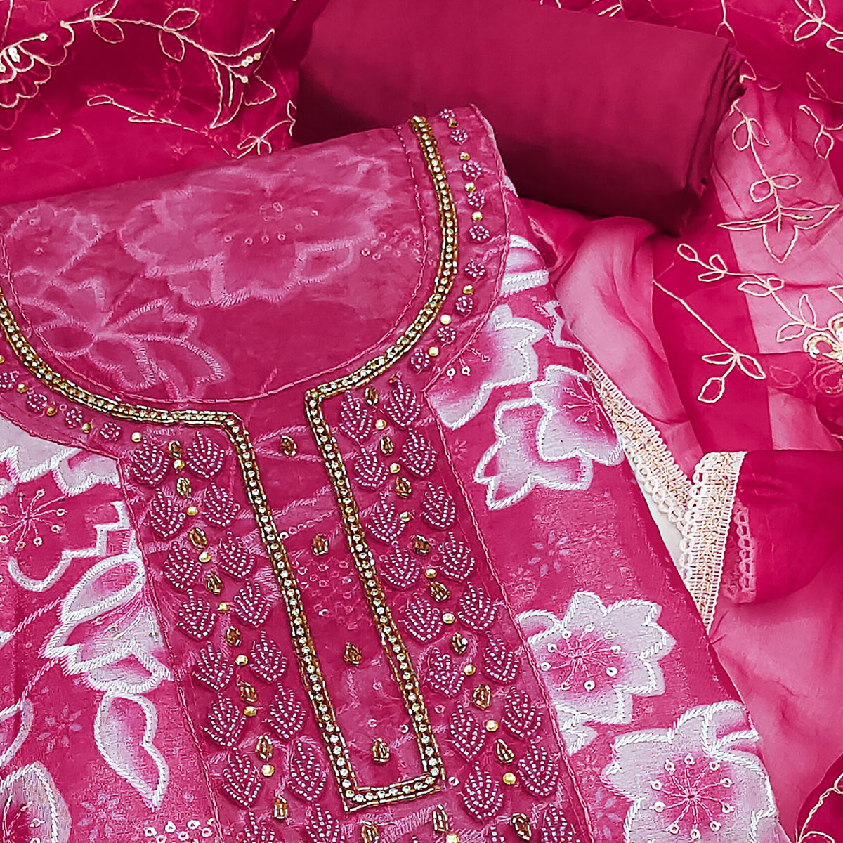 Pink Delicate Floral Sequins & Hand Embellishments On Flowing Organza Dress Material