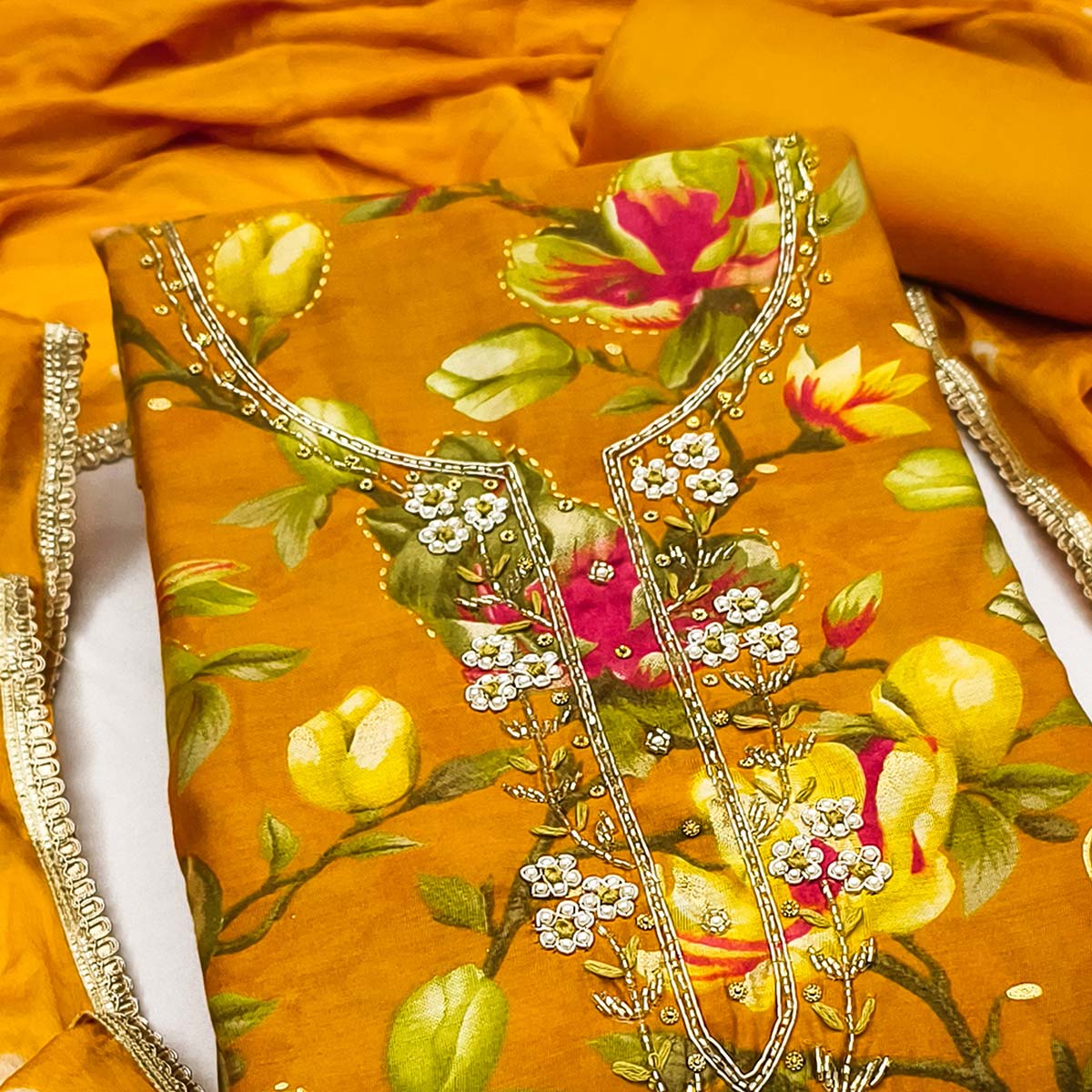 Exclusive Mustard Floral Printed Cotton Silk Dress Material Adorned With Beads & Moti Handwork