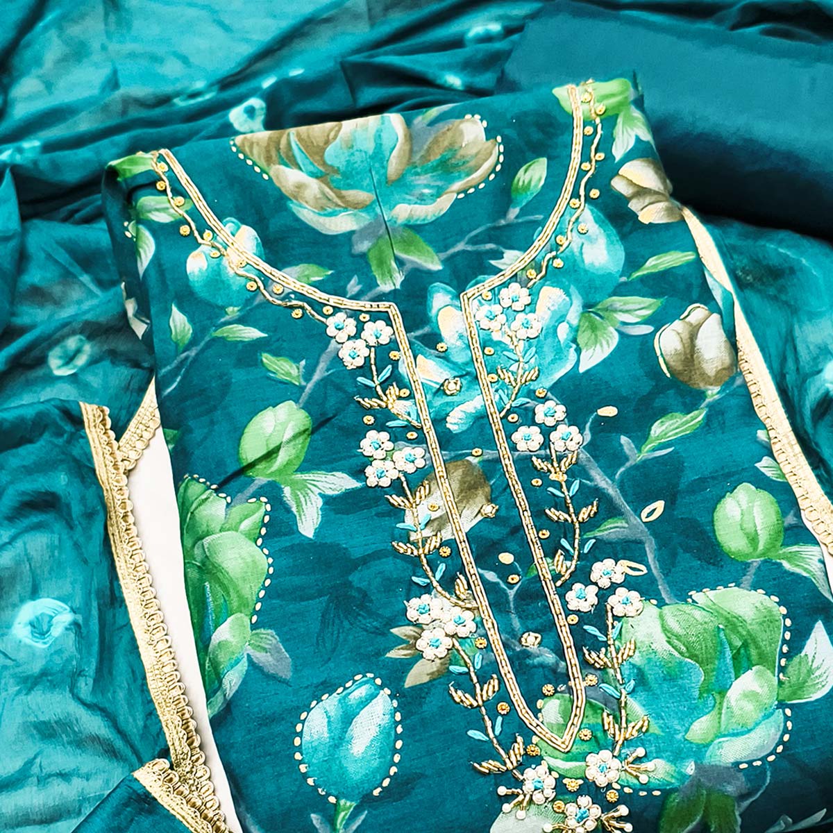 Exclusive Teal Floral Printed Cotton Silk Dress Material Adorned With Beads & Moti Handwork