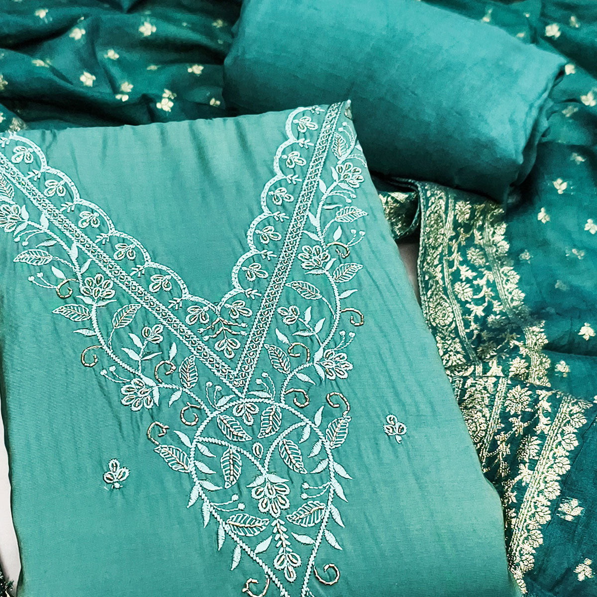 Exclusive Teal Floral Embroidery Viscose Dress Material Enhanced With Cutdana Handwork Accents