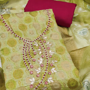 Sophisticated Green Zari Woven Jacquard Dress Material Highlighted With Floral Handwork