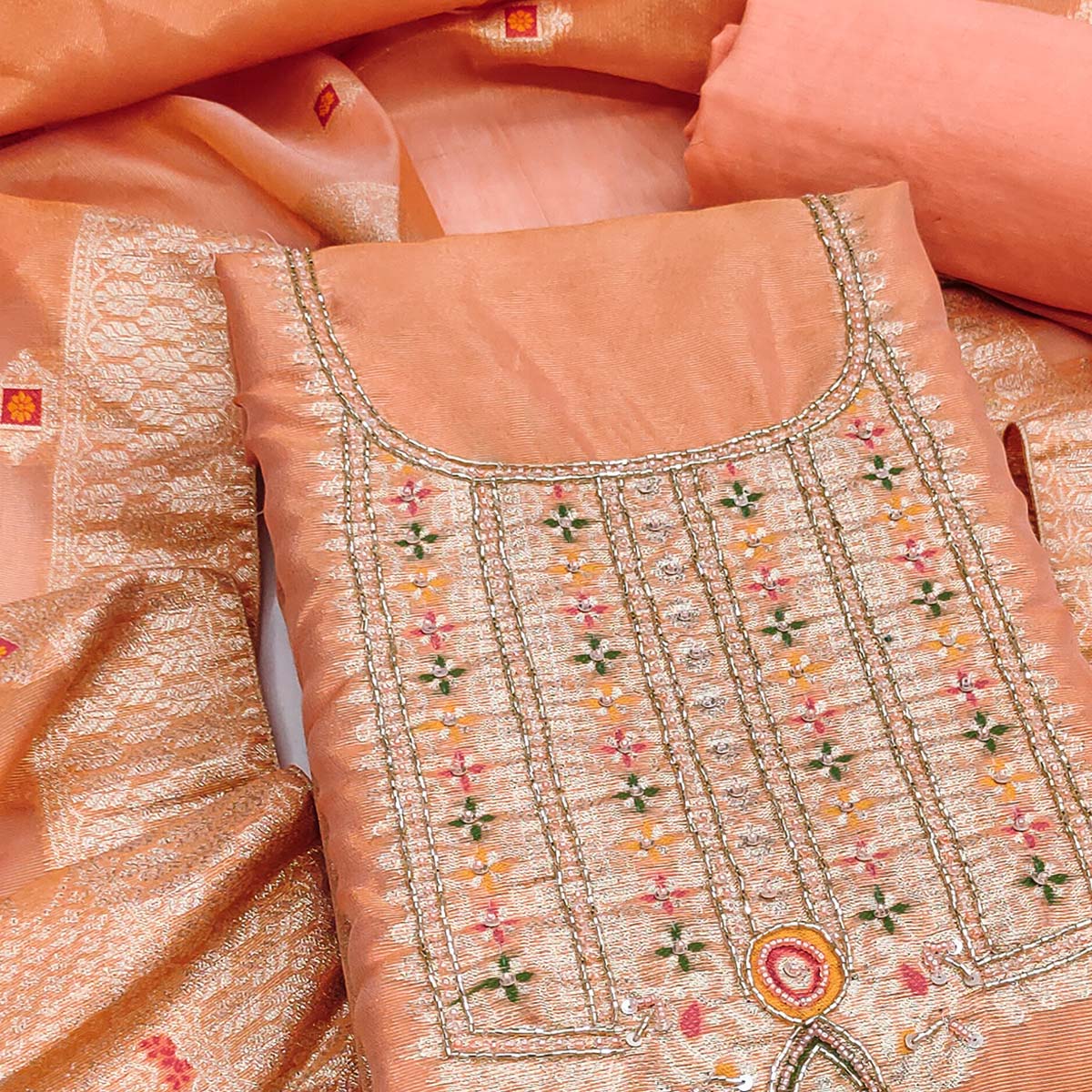 Elegant Peach Floral Weaving Shimmer Banarasi Dress Material With Beads & Sequins Neckline Work