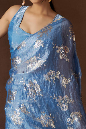 Blue Floral Foil Printed Satin Silk Saree With Zarkan Border