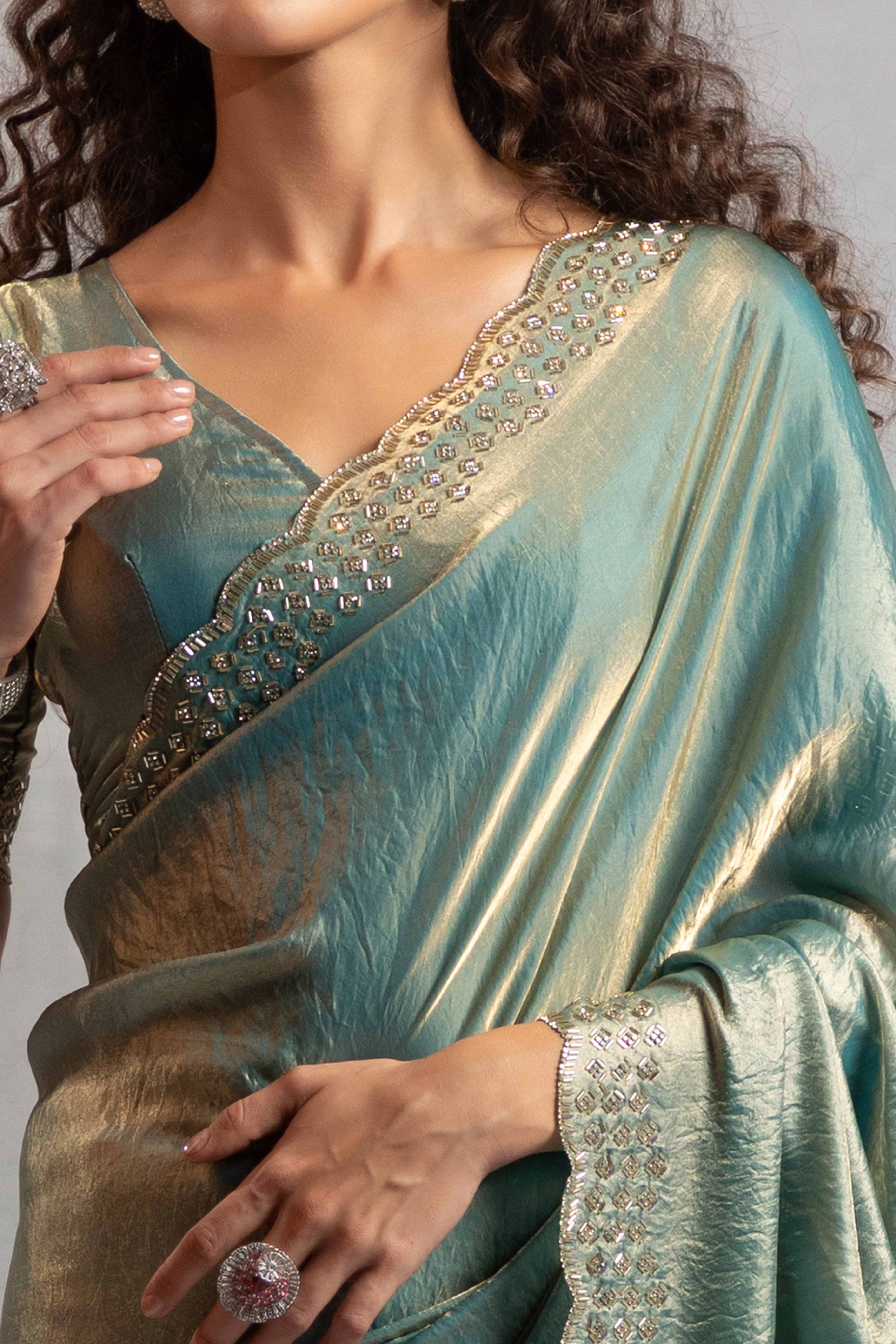 Sea Green Satin Saree with Glamorous Stone Embellishment