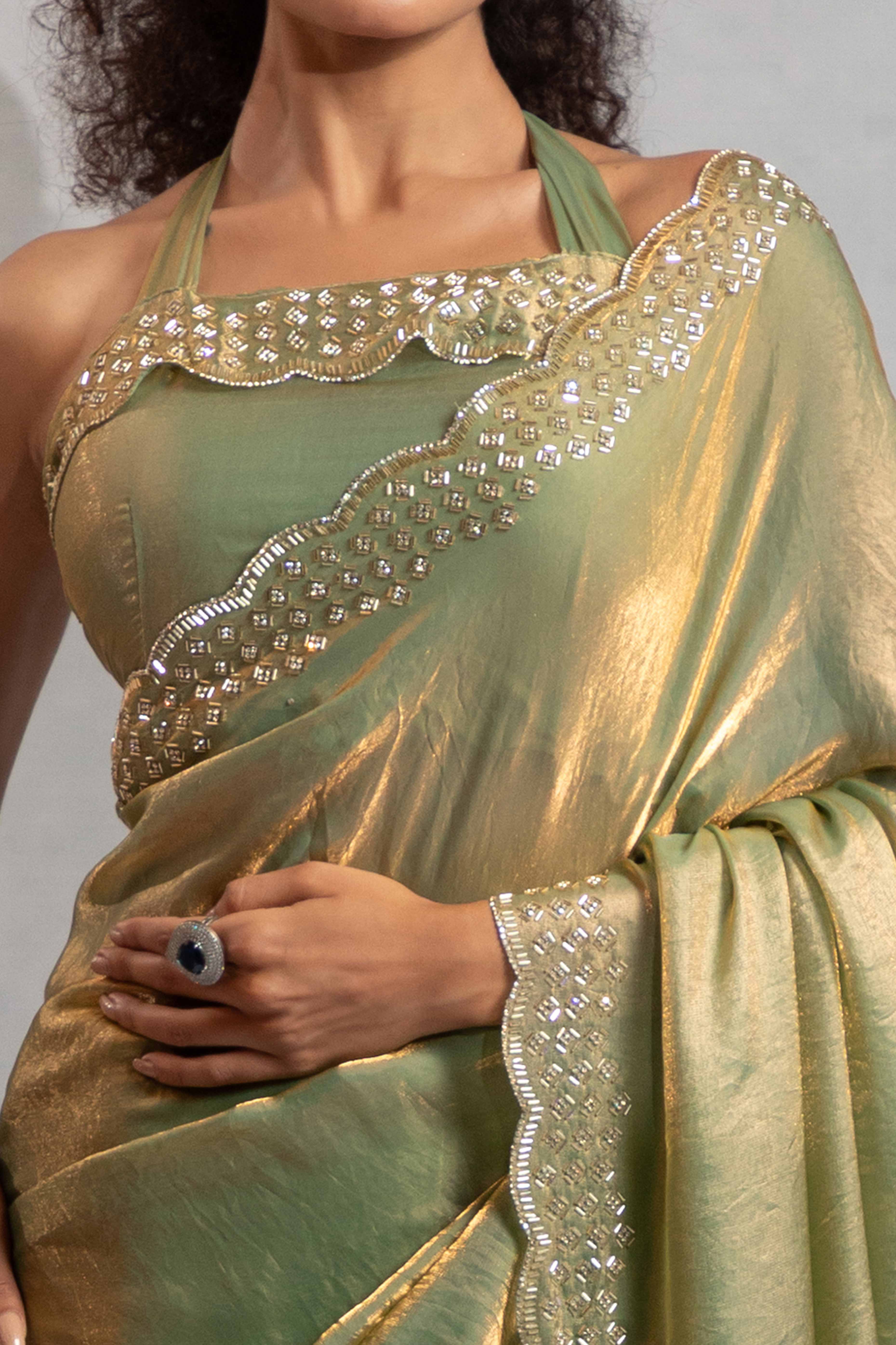 Pista Green Satin Saree with Glamorous Stone Embellishment