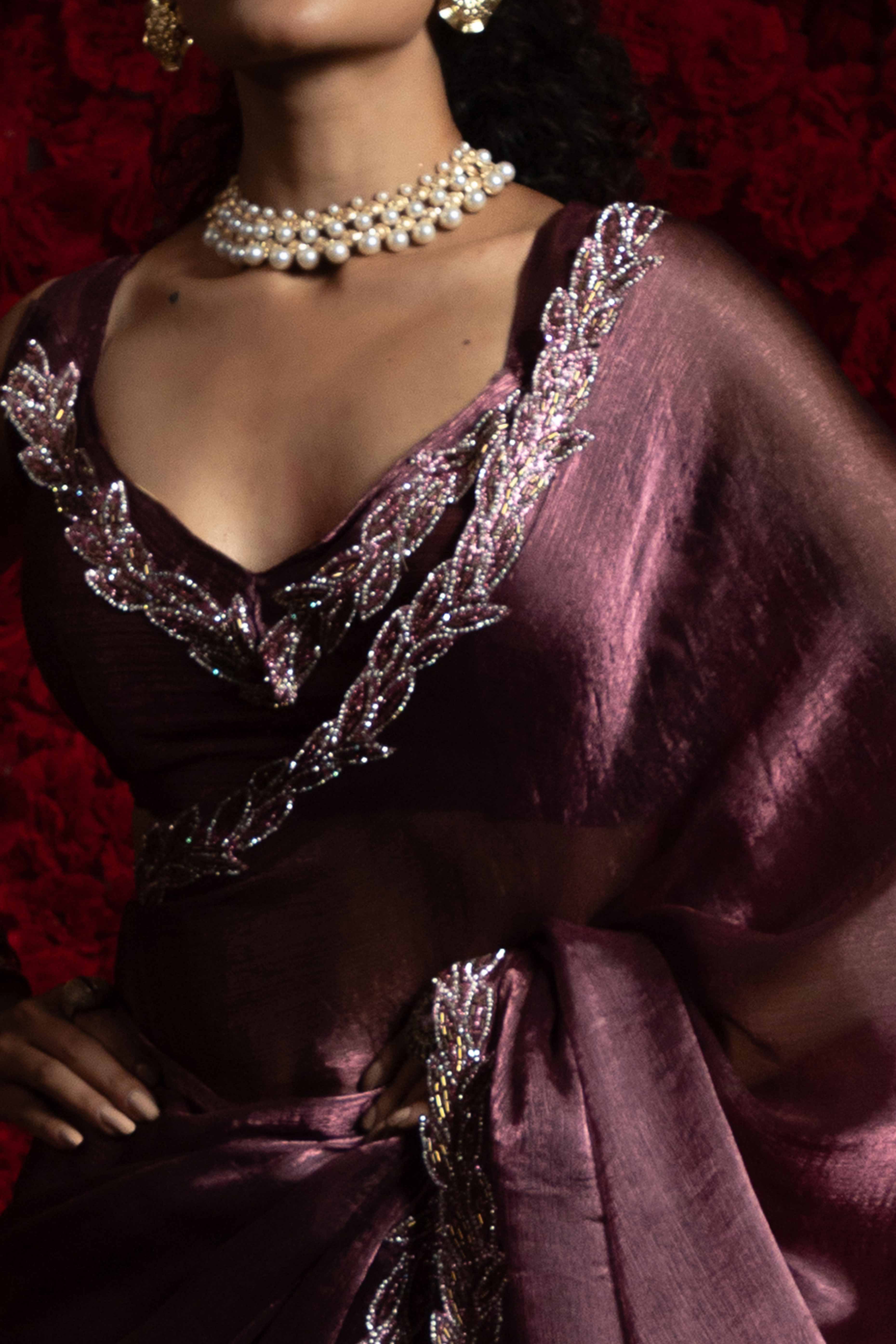 Deep Mauve Solid Tissue Chiffon Saree Accented With Elegant Zarkan Work Border