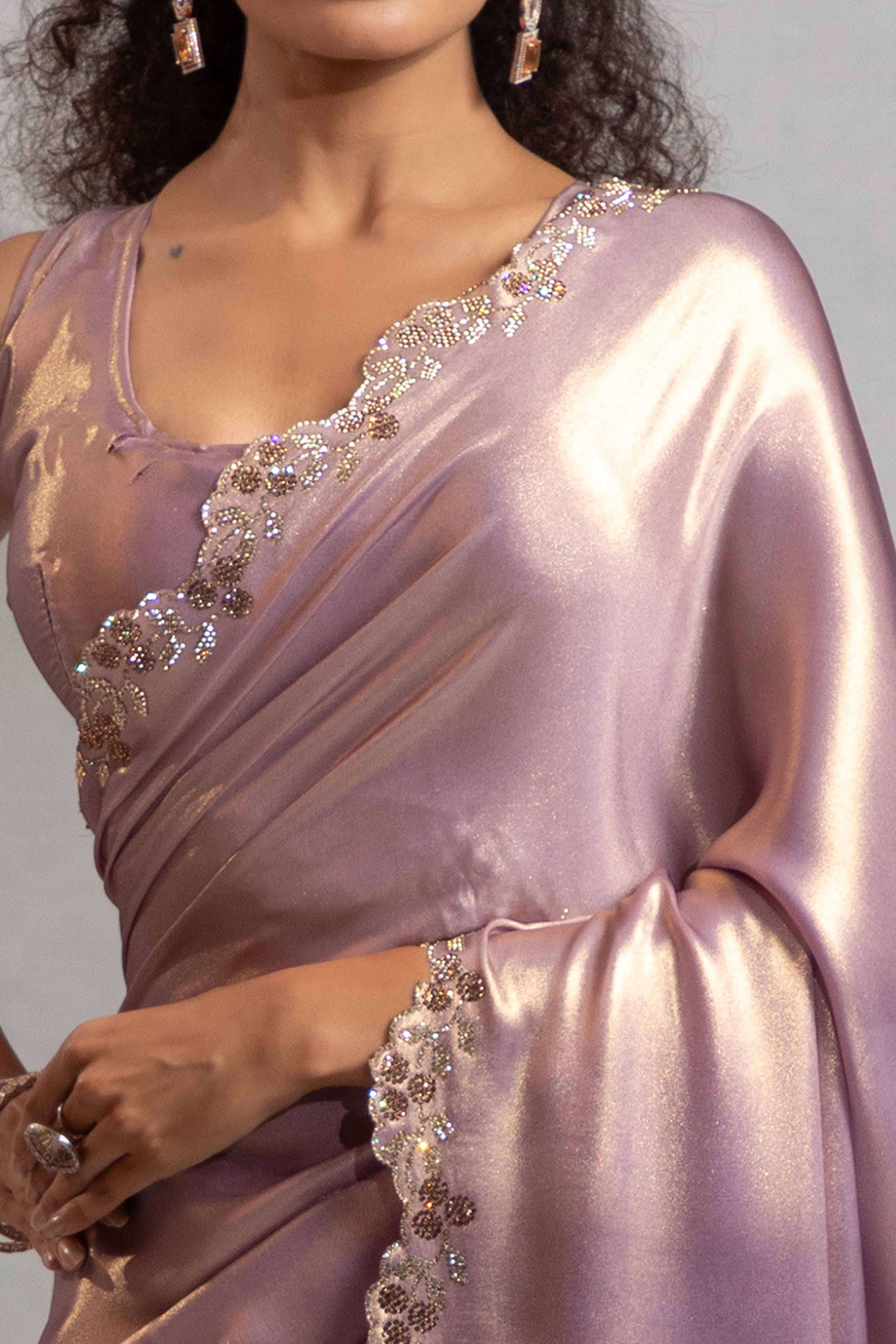 Lavender Satin Georgette Saree Adorned With Subtle Foil Finish & A Sparkling Zarkan Work Border