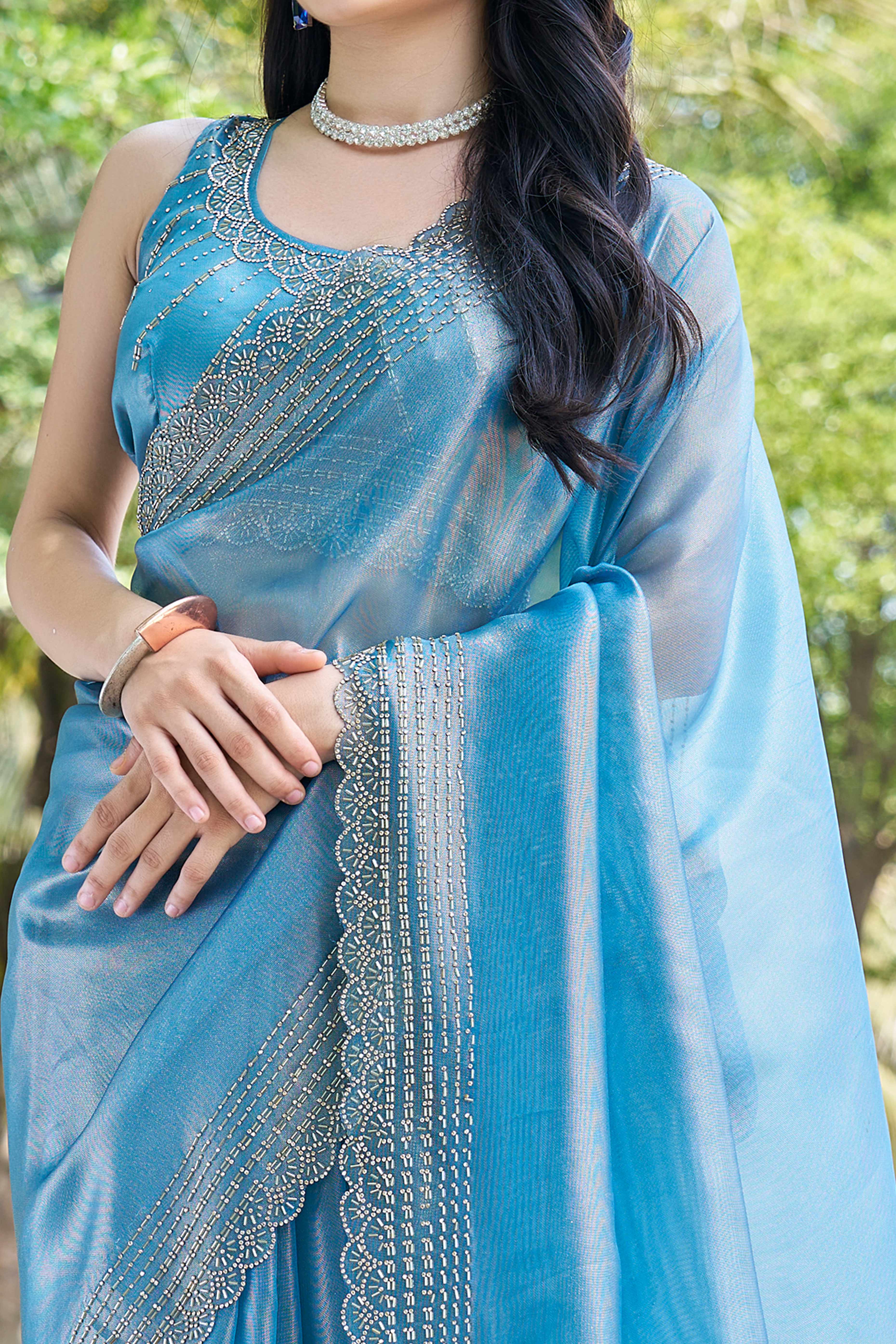 Teal Soft Organza Saree with Stone Embellishments Work