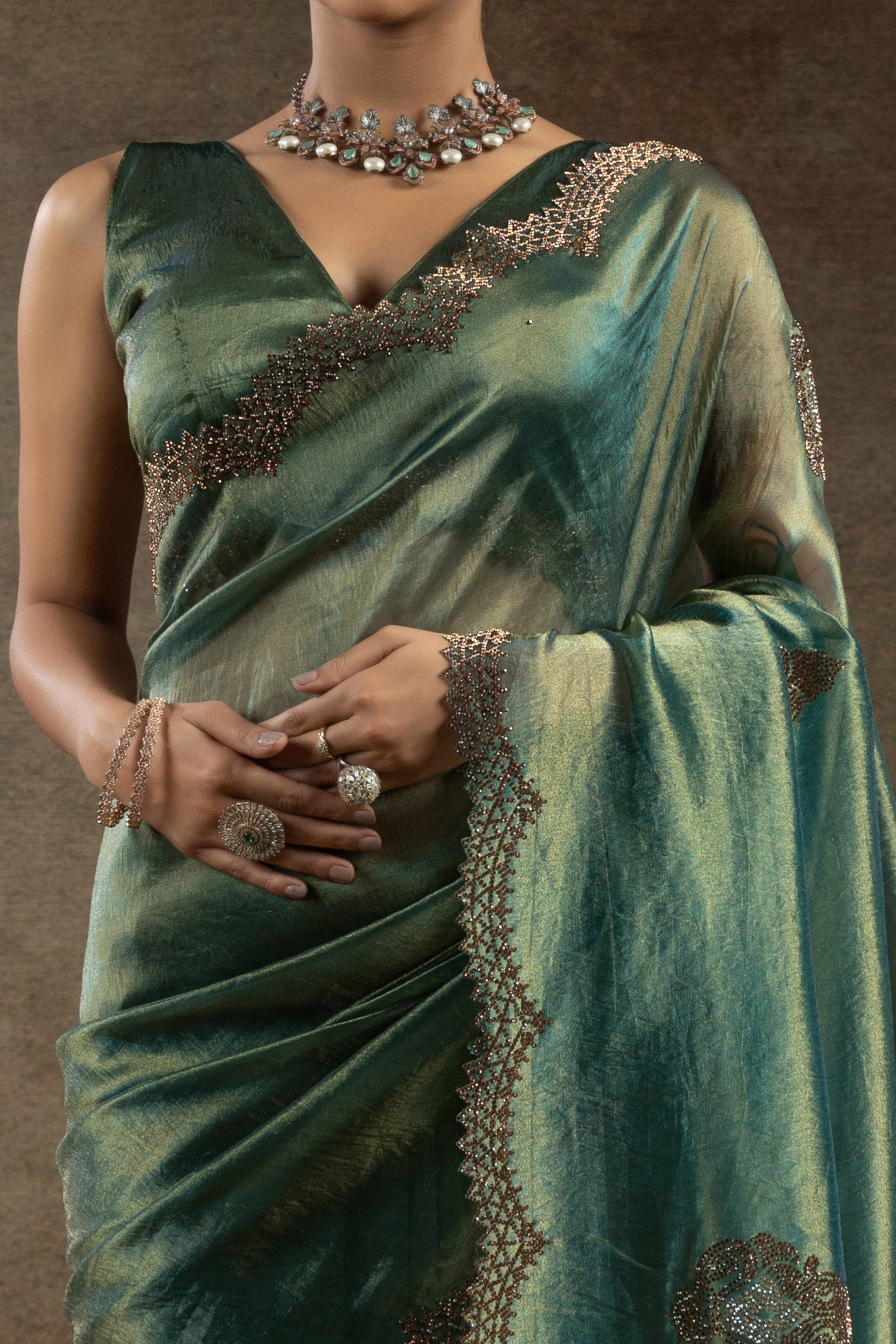 Green Banarasi Silk Saree with Stone Embellishments Perfect for Party Wear
