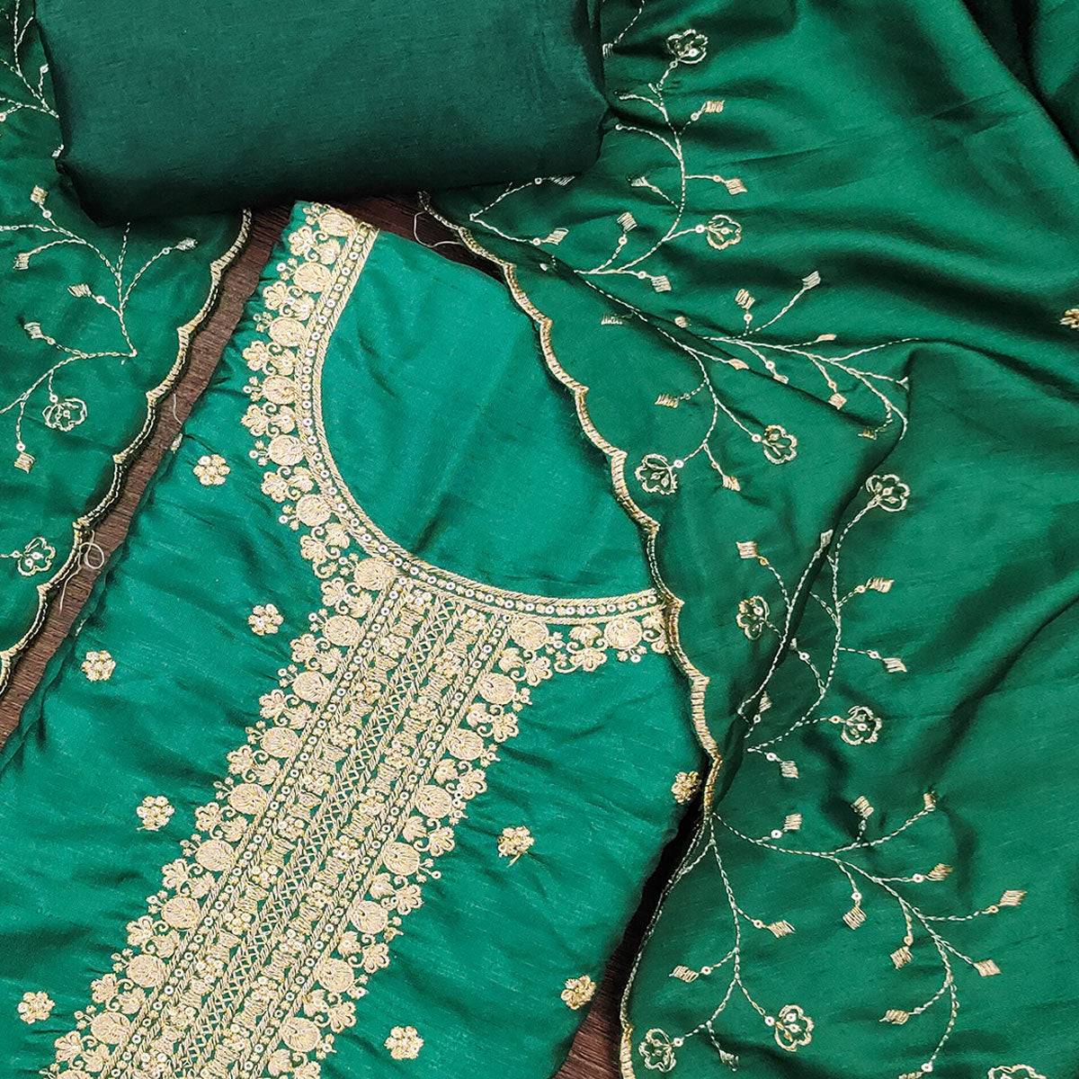 Green Cotton Silk Unstitched Dress Material Featuring Delicate Jalpari Embroidery
