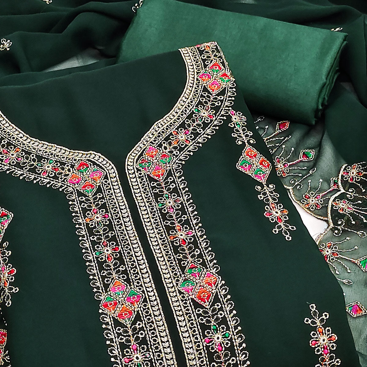 Green Georgette Dress Material Enhanced With Graceful Floral Embroidery For An Elegant Ethnic Look