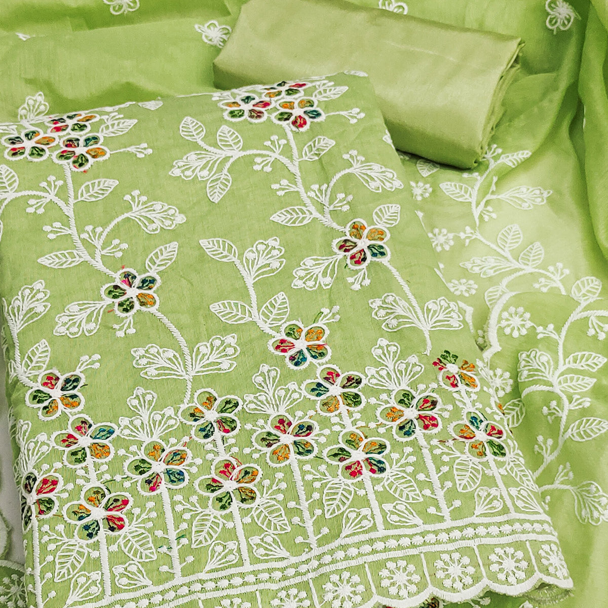 Light Green Chanderi Cotton Dress Material Adorned With Elegant Floral Thread Embroidery Work