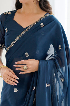 Blue Partywear Star Georgette Saree Adorned with Floral Embroidery and Beads Work