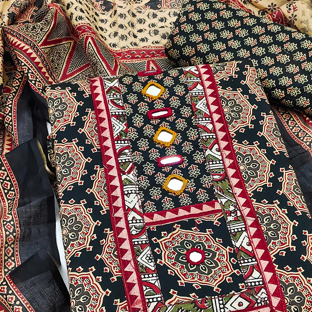 Ethnic Black Floral Printed Pure Cotton Dress Material Accented With Fine Neck Embroidery Work